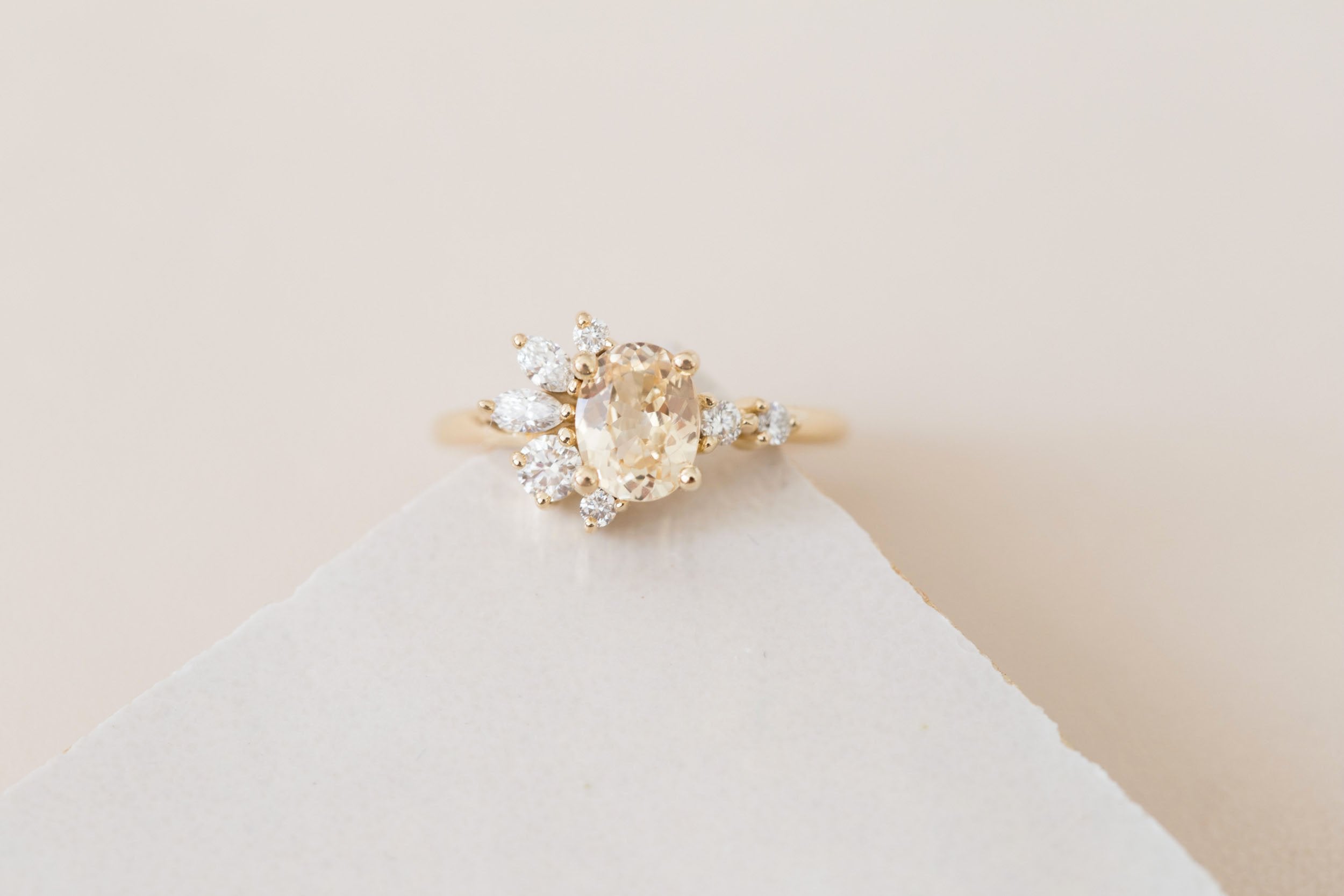 Ambretta Ring | Apricot Oval Sapphire + Diamond Cluster Engagement Ring 1.36 ct | 14k Recycled Gold | One of a Kind