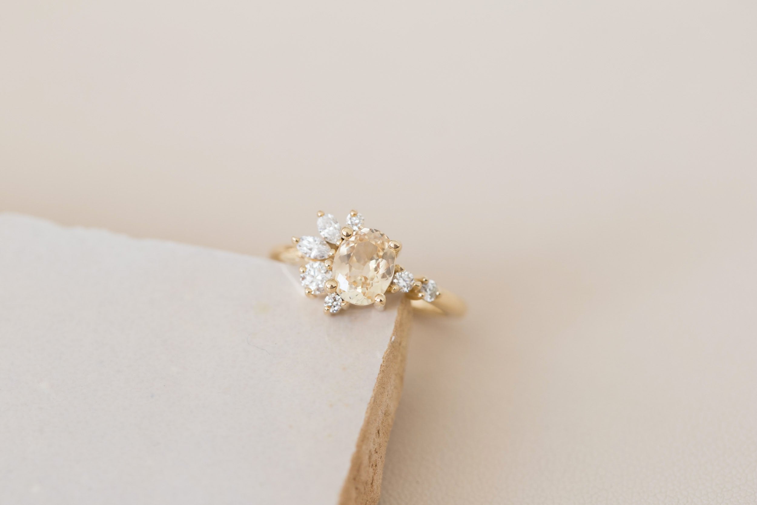 Ambretta Ring | Apricot Oval Sapphire + Diamond Cluster Engagement Ring 1.36 ct | 14k Recycled Gold | One of a Kind