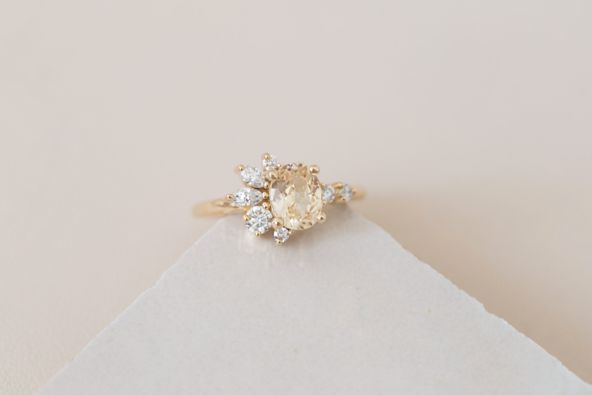 Ambretta Ring | Apricot Oval Sapphire + Diamond Cluster Engagement Ring 1.36 ct | 14k Recycled Gold | One of a Kind
