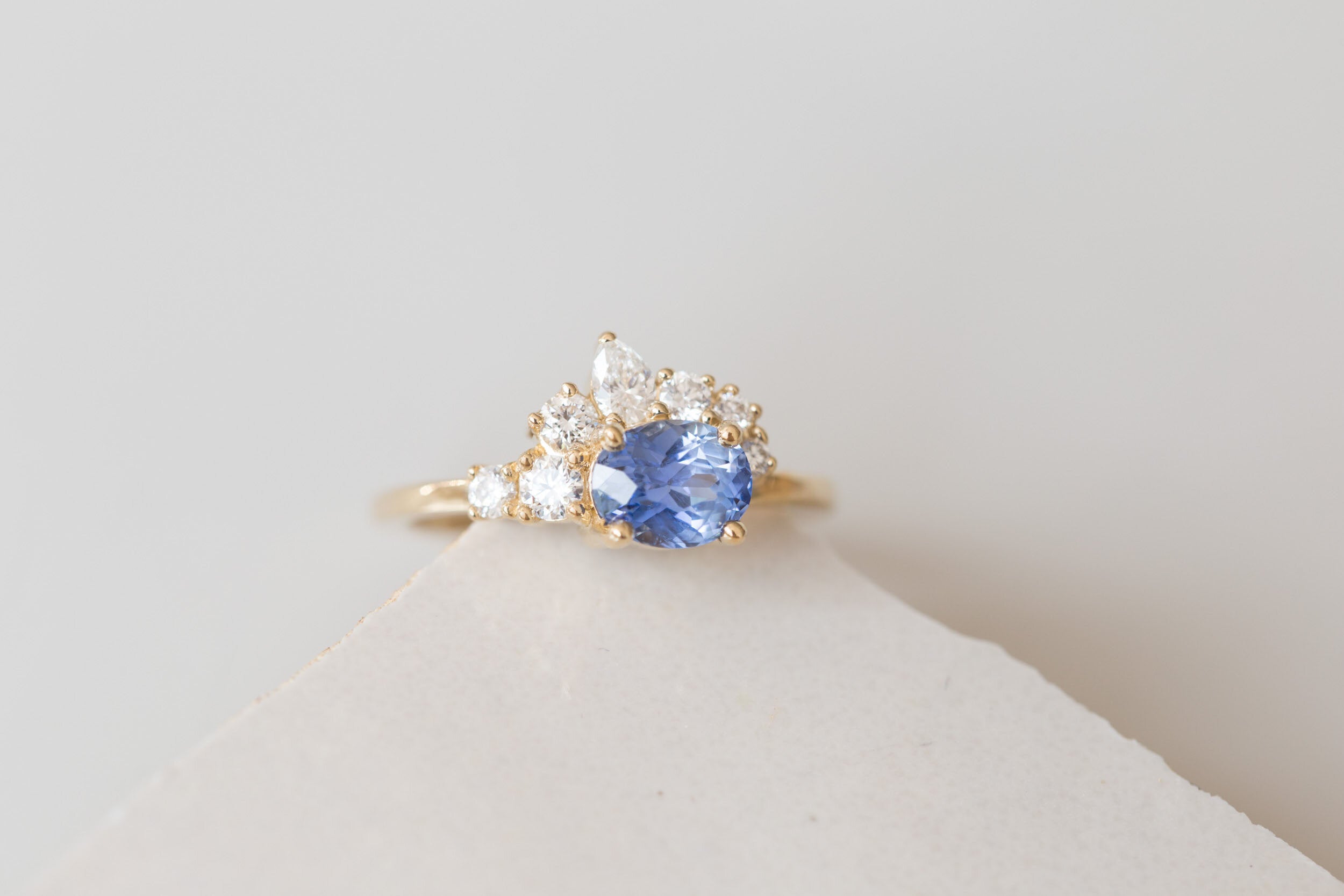 Hana Ring | Blue Oval Sapphire + Diamond Cluster Engagement Ring 1.32 ct | 14k Recycled Gold | One of a Kind