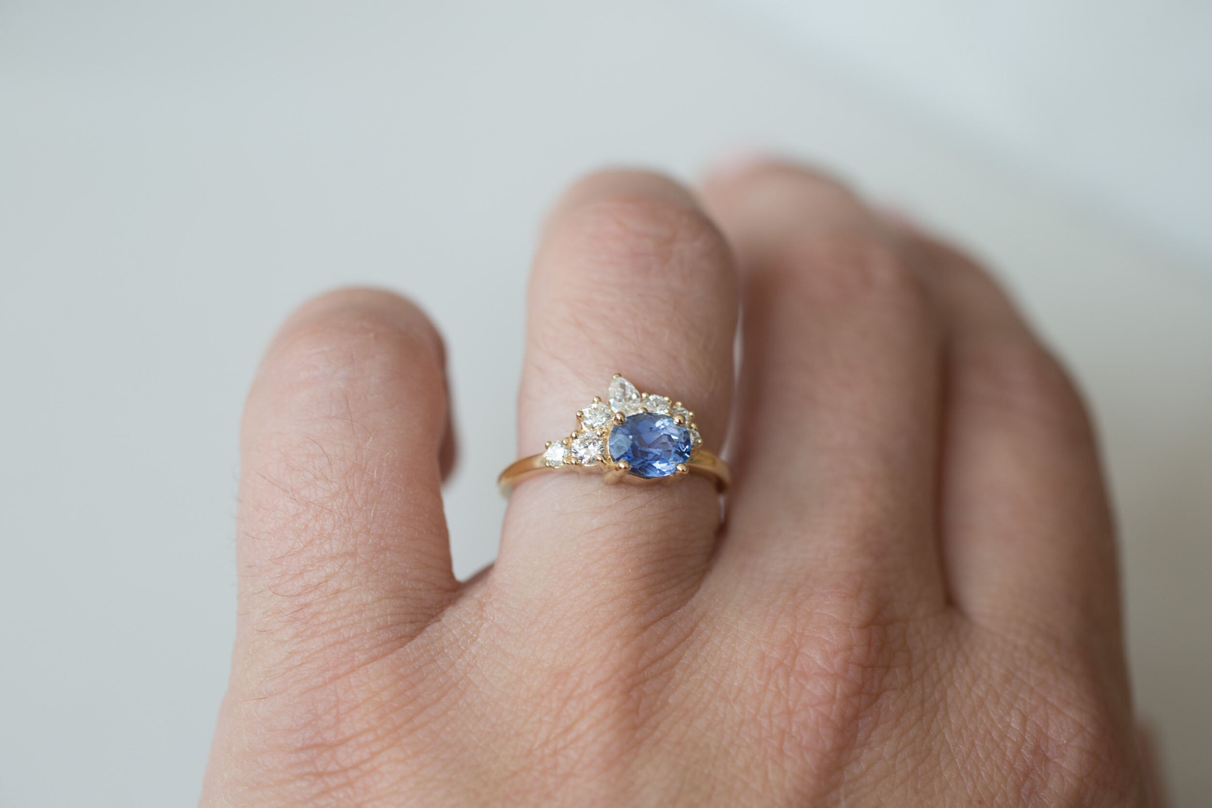 Hana Ring | Blue Oval Sapphire + Diamond Cluster Engagement Ring 1.32 ct | 14k Recycled Gold | One of a Kind