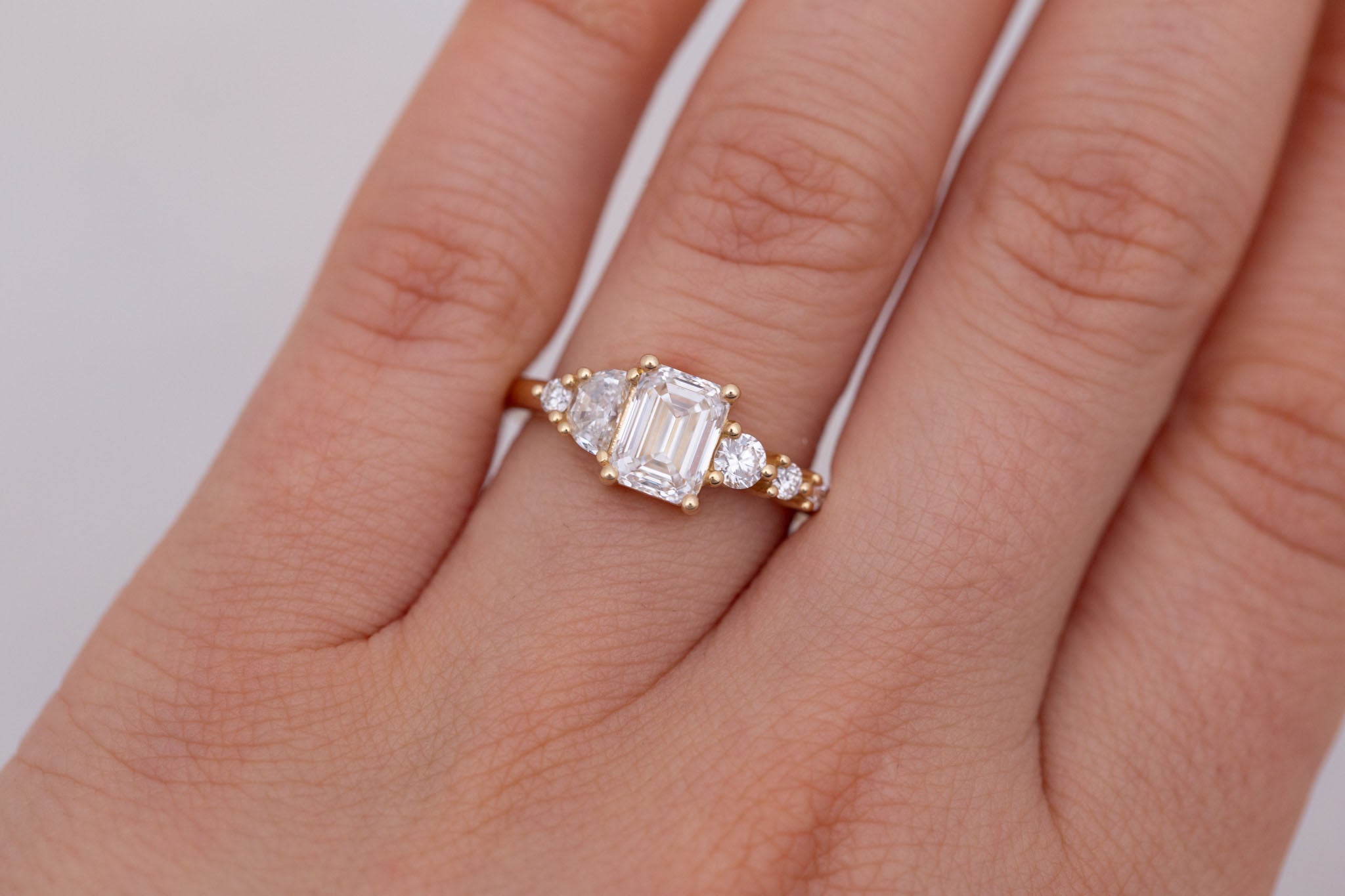Sarine Ring | Lab Emerald Cut + Half Moon Diamond + Diamond Cluster Engagement Ring 1.41 ct | 14k Recycled Gold | One of a Kind