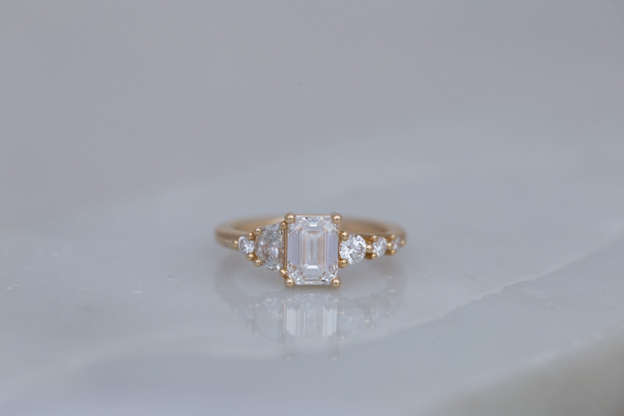 Sarine Ring | Lab Emerald Cut + Half Moon Diamond + Diamond Cluster Engagement Ring 1.41 ct | 14k Recycled Gold | One of a Kind