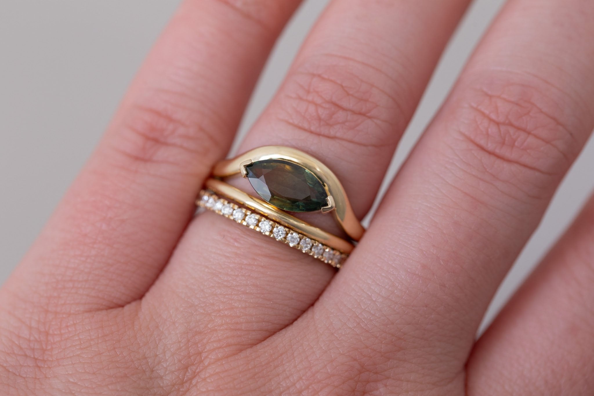 Rhodes Ring | Olive Green Marquise Sapphire Solitaire + Curved Band Engagement Ring 1.42 ct | 14k Recycled Gold | One of a Kind