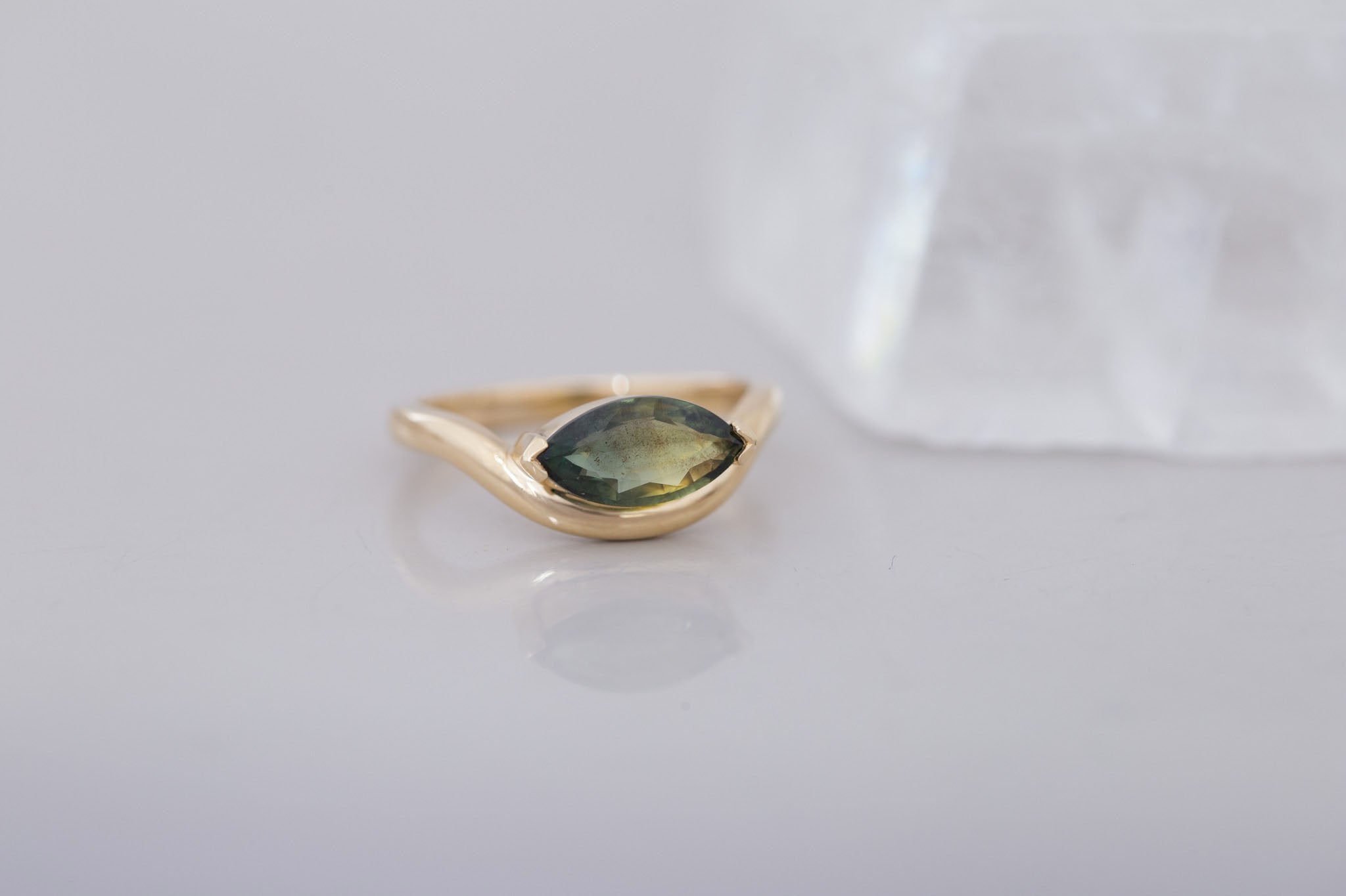 Rhodes Ring | Olive Green Marquise Sapphire Solitaire + Curved Band Engagement Ring 1.42 ct | 14k Recycled Gold | One of a Kind