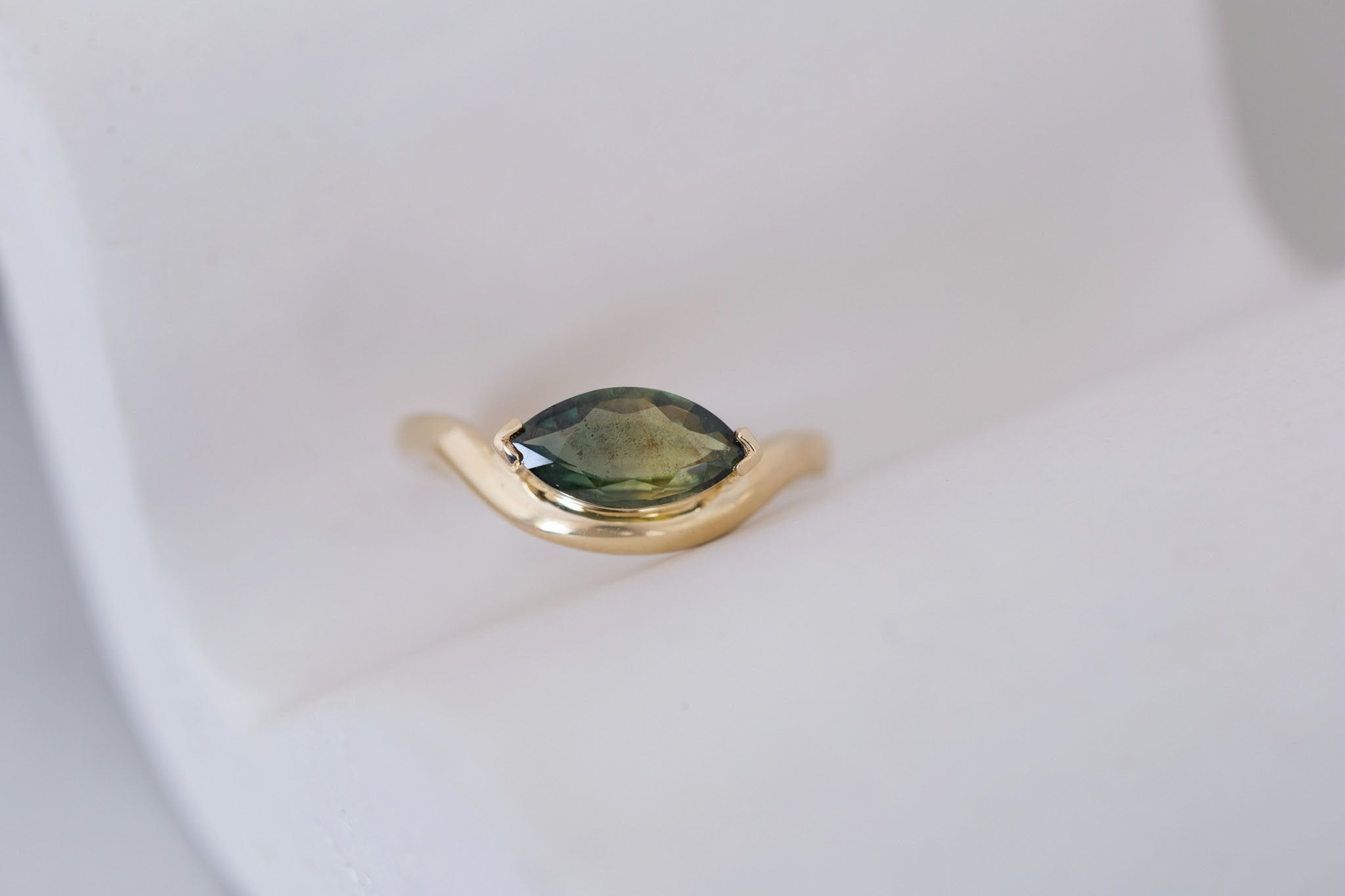 Rhodes Ring | Olive Green Marquise Sapphire Solitaire + Curved Band Engagement Ring 1.42 ct | 14k Recycled Gold | One of a Kind