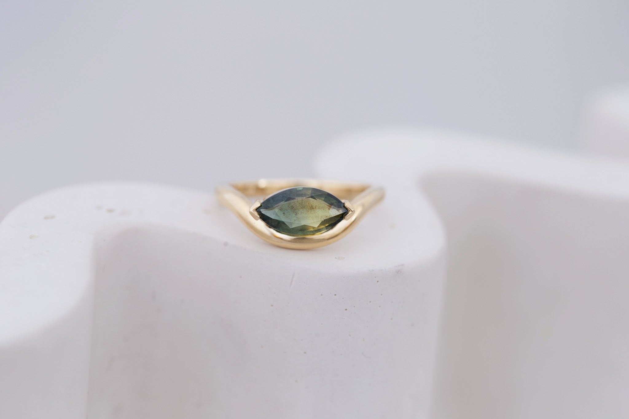 Rhodes Ring | Olive Green Marquise Sapphire Solitaire + Curved Band Engagement Ring 1.42 ct | 14k Recycled Gold | One of a Kind
