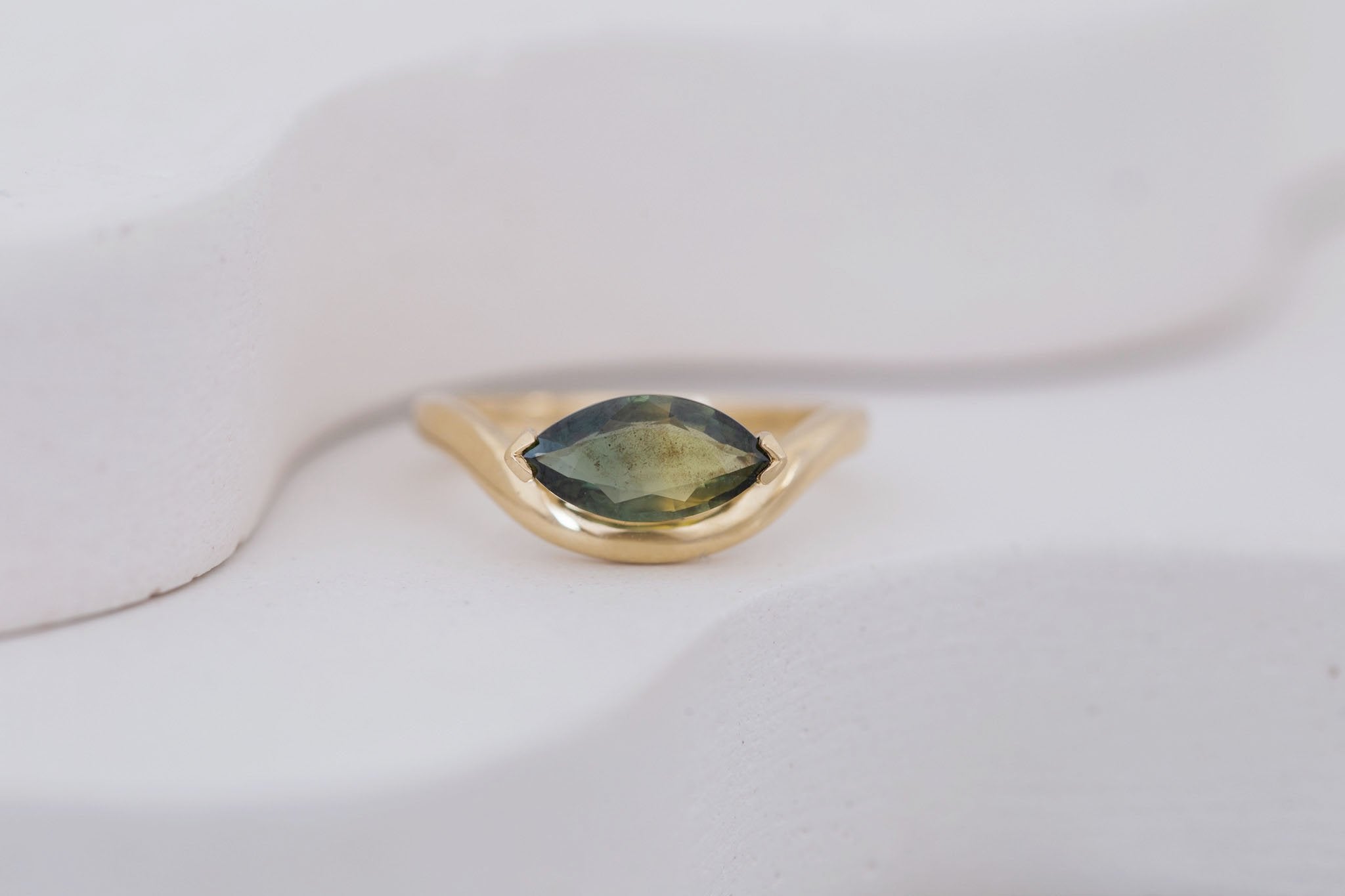 Rhodes Ring | Olive Green Marquise Sapphire Solitaire + Curved Band Engagement Ring 1.42 ct | 14k Recycled Gold | One of a Kind
