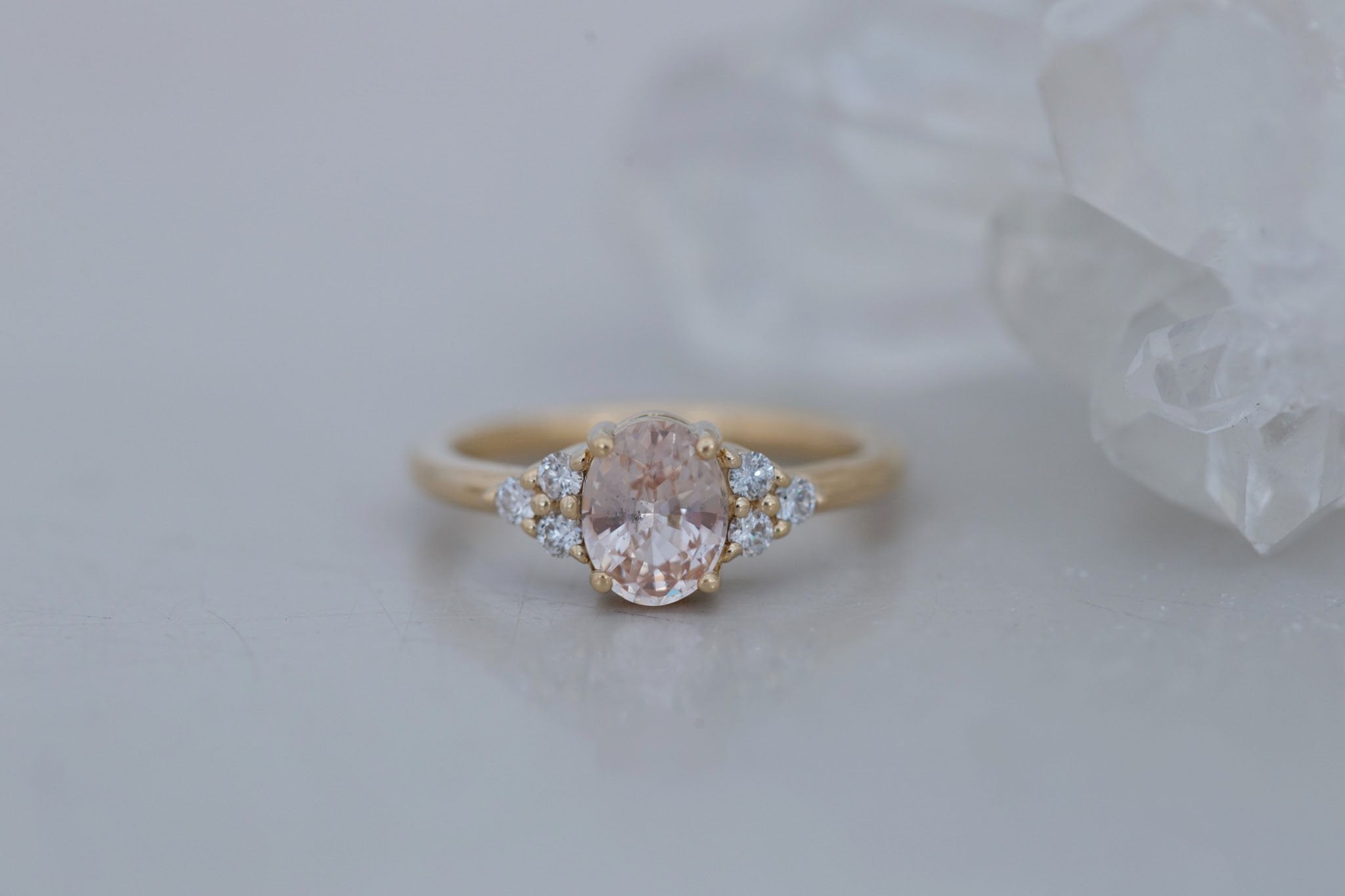 Verona Ring | Peach Oval Sapphire + Round Diamond Accents Engagement Ring 1.46 ct | 14k Recycled Gold | One of a Kind