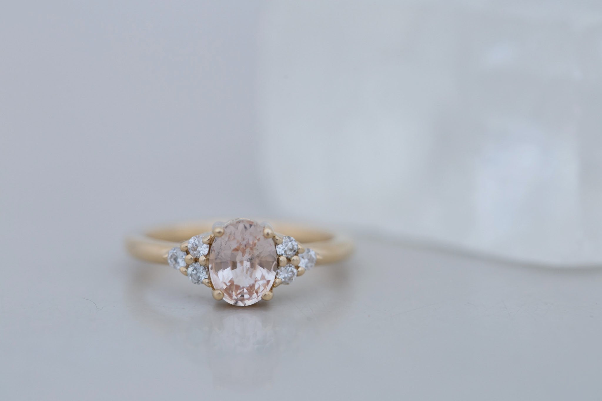 Verona Ring | Peach Oval Sapphire + Round Diamond Accents Engagement Ring 1.46 ct | 14k Recycled Gold | One of a Kind