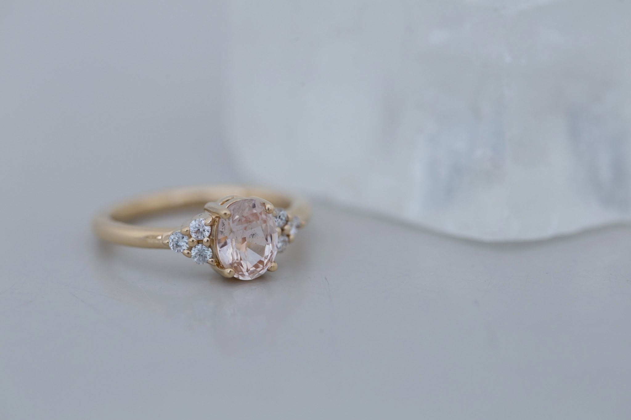 Verona Ring | Peach Oval Sapphire + Round Diamond Accents Engagement Ring 1.46 ct | 14k Recycled Gold | One of a Kind