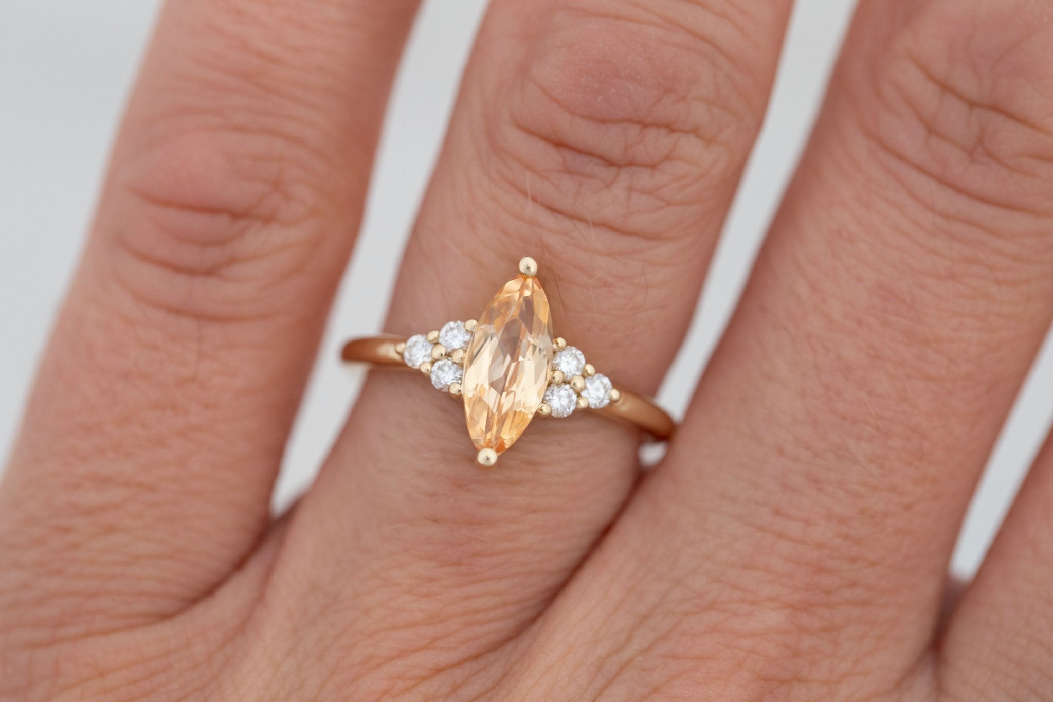 Verona Ring | Peach Marquise Sapphire + Round Diamond Accents Engagement Ring 1.52 ct | 14k Recycled Gold | One of a Kind