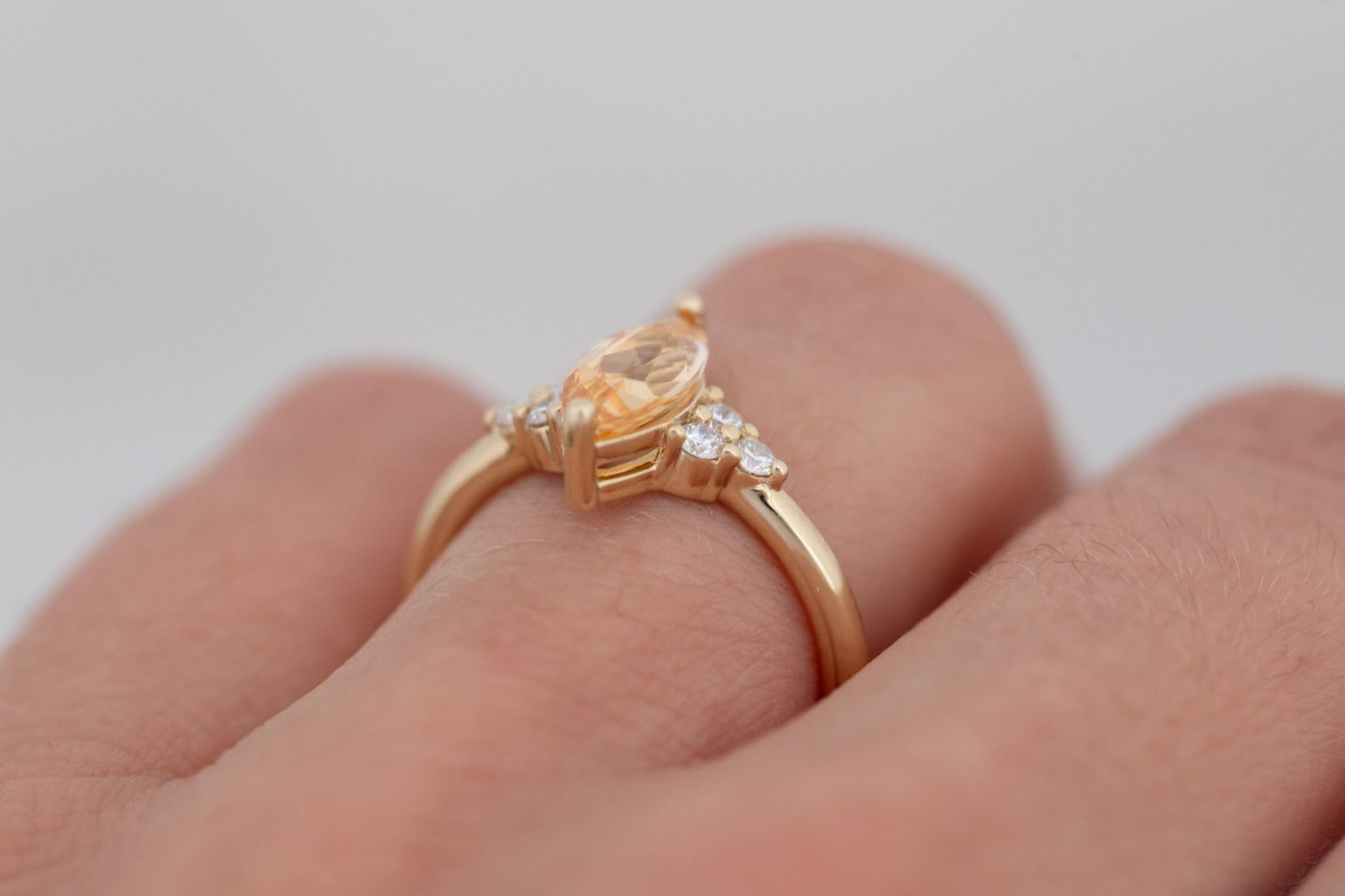 Verona Ring | Peach Marquise Sapphire + Round Diamond Accents Engagement Ring 1.52 ct | 14k Recycled Gold | One of a Kind