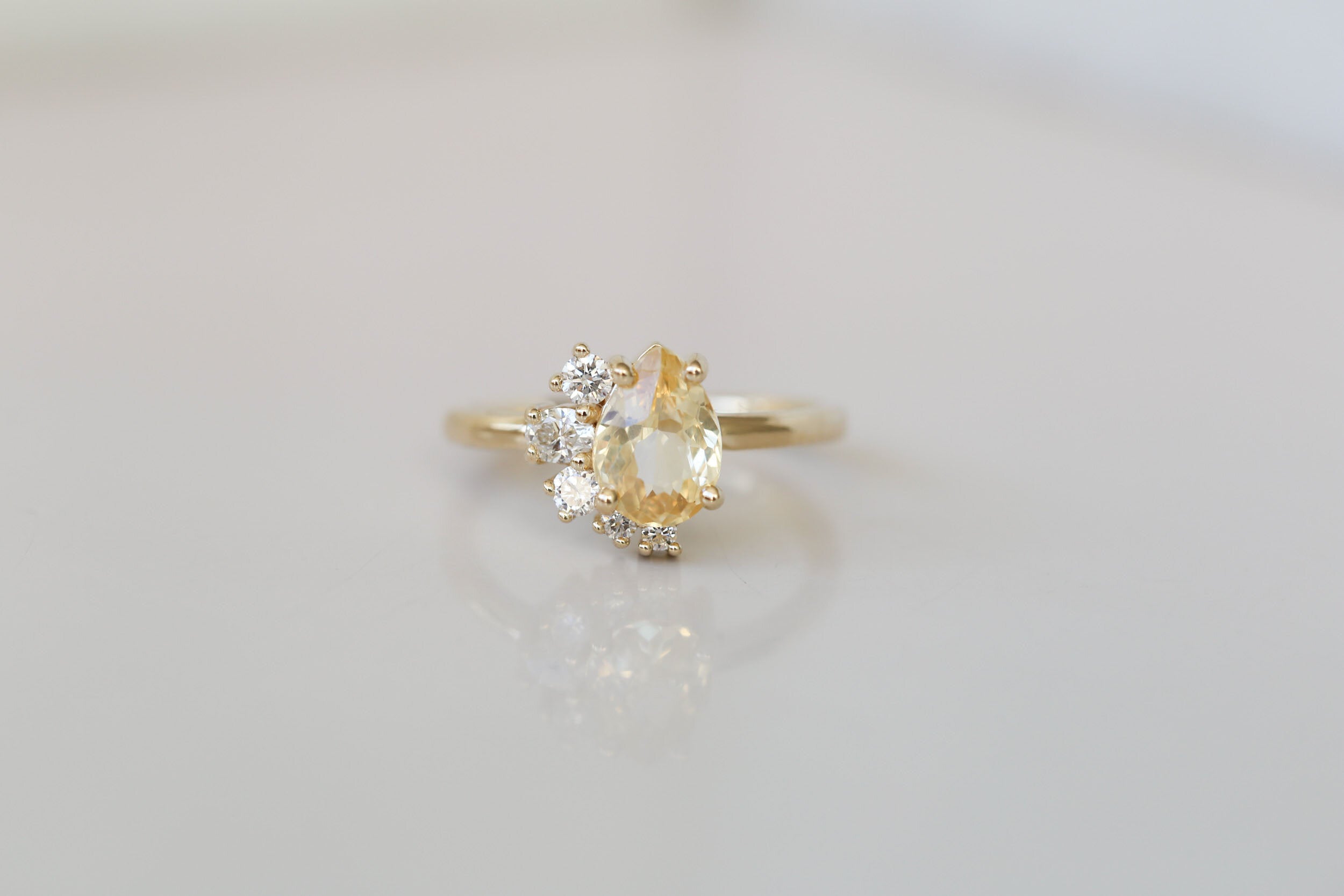 Evaline Ring | Pear Cut Apricot Sapphire + Asymmetrical Diamond Cluster Engagement Ring | 14k Recycled Gold | One of a Kind