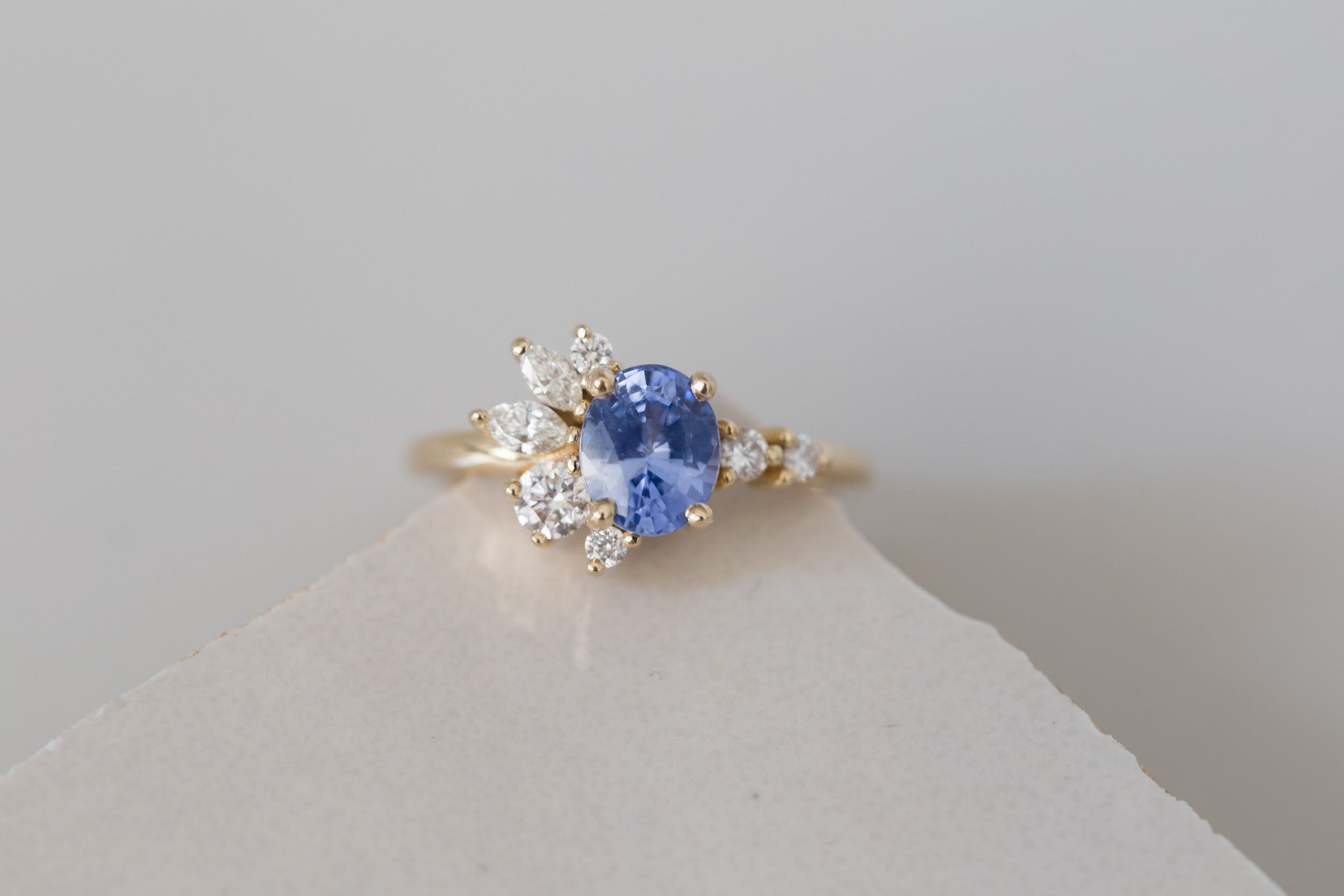 Ambretta Ring | Blue Oval Sapphire + Diamond Cluster Engagement Ring 1.59 ct | 14k Recycled Gold | One of a Kind