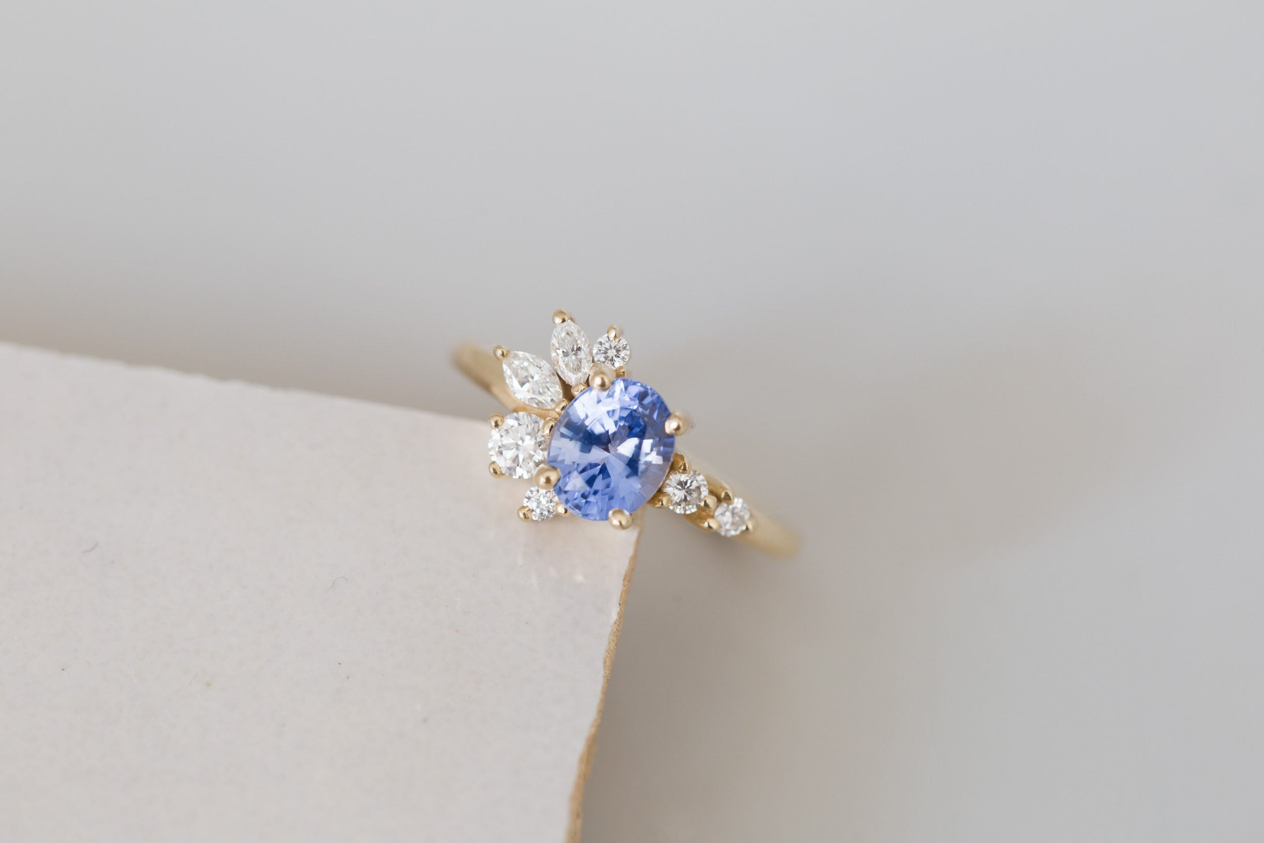 Ambretta Ring | Blue Oval Sapphire + Diamond Cluster Engagement Ring 1.59 ct | 14k Recycled Gold | One of a Kind