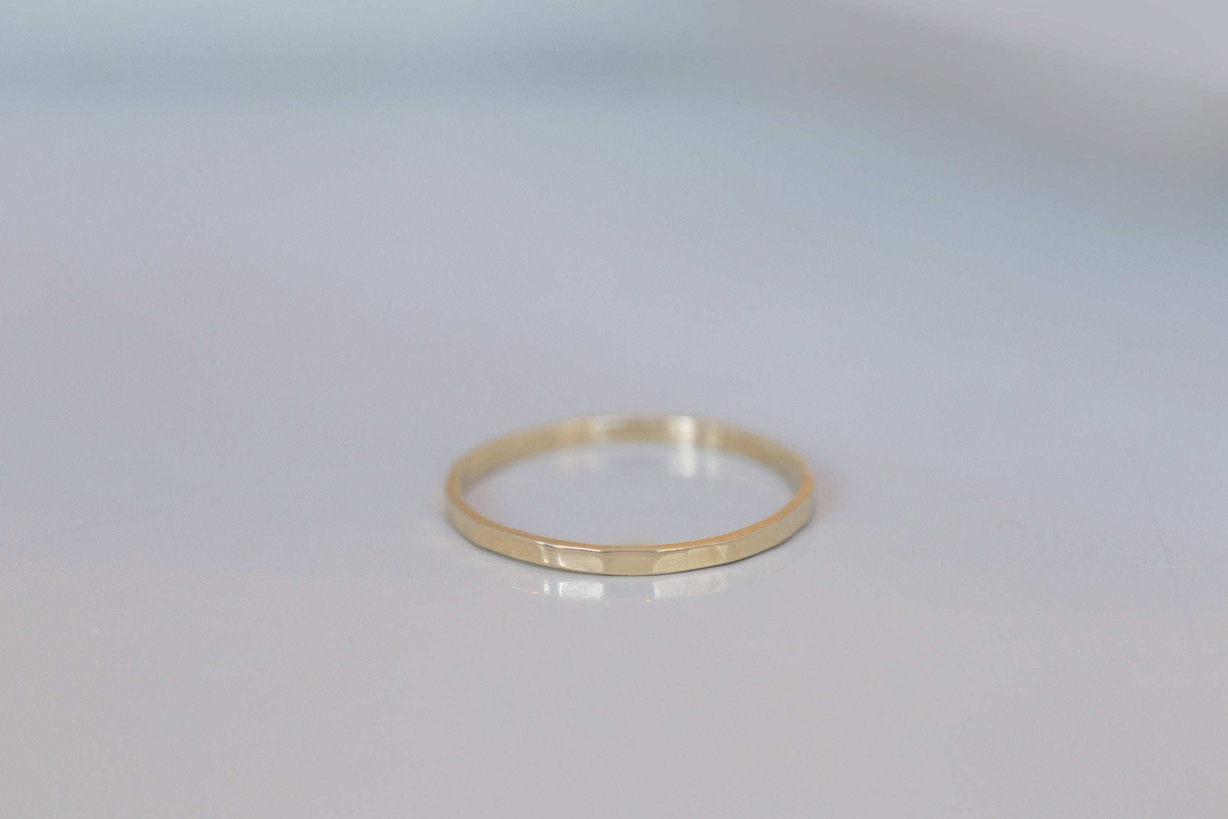 1.5 x 1 mm Hammered Flat Band | 14k Recycled Gold