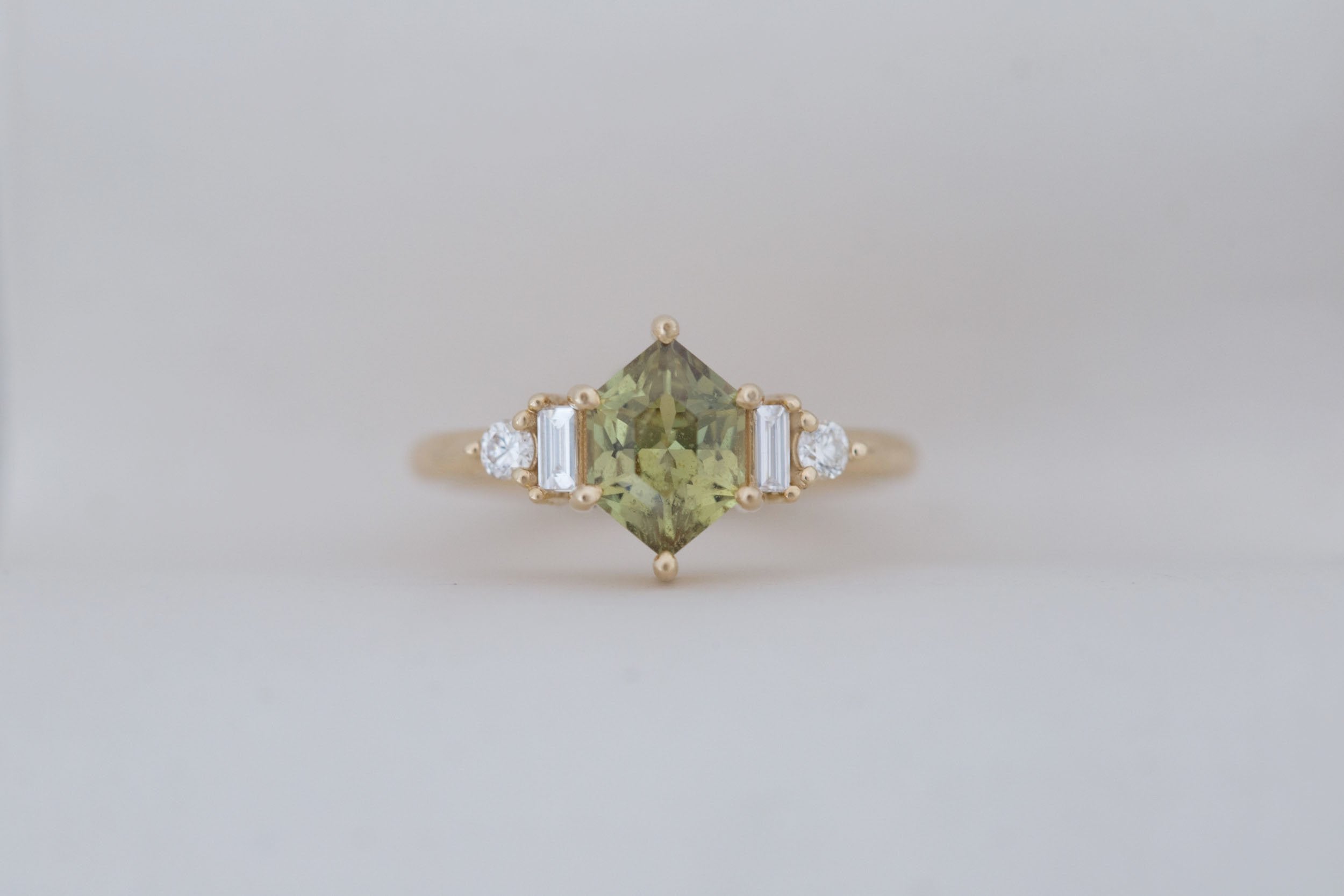 Alsea Ring | Light Olive Green Hexagonal Sapphire + Baguette and Round Diamond Accent Engagement Ring 1.66 ct | 14k Recycled Gold | One of a Kind