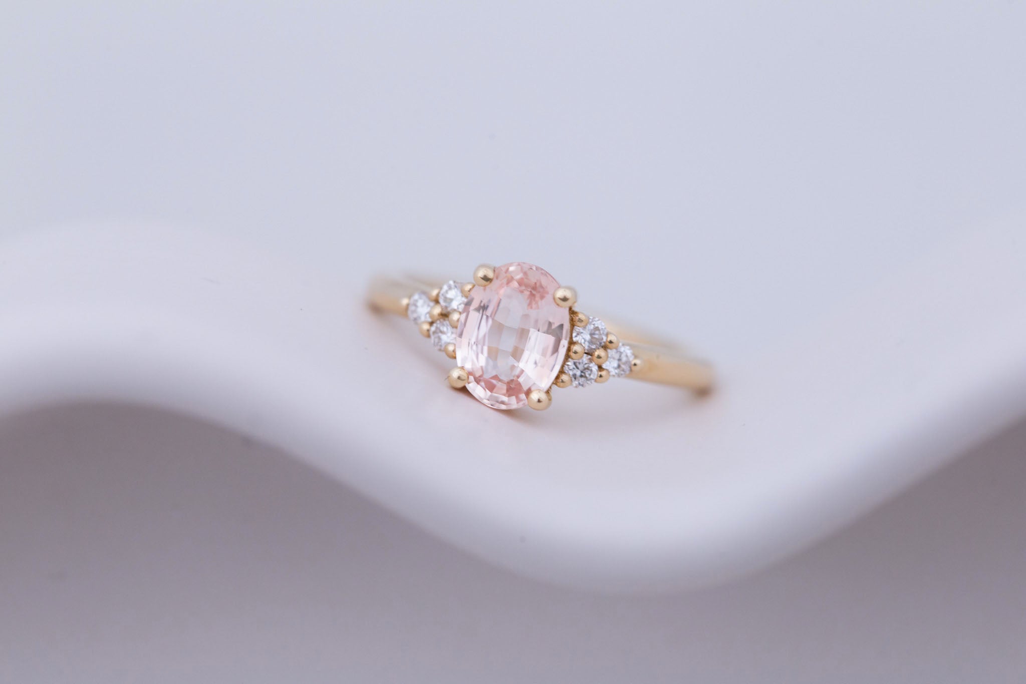 Verona Ring | Peach Oval Sapphire + Round Diamond Accents Engagement Ring 1.68 ct | 14k Recycled Gold | One of a Kind