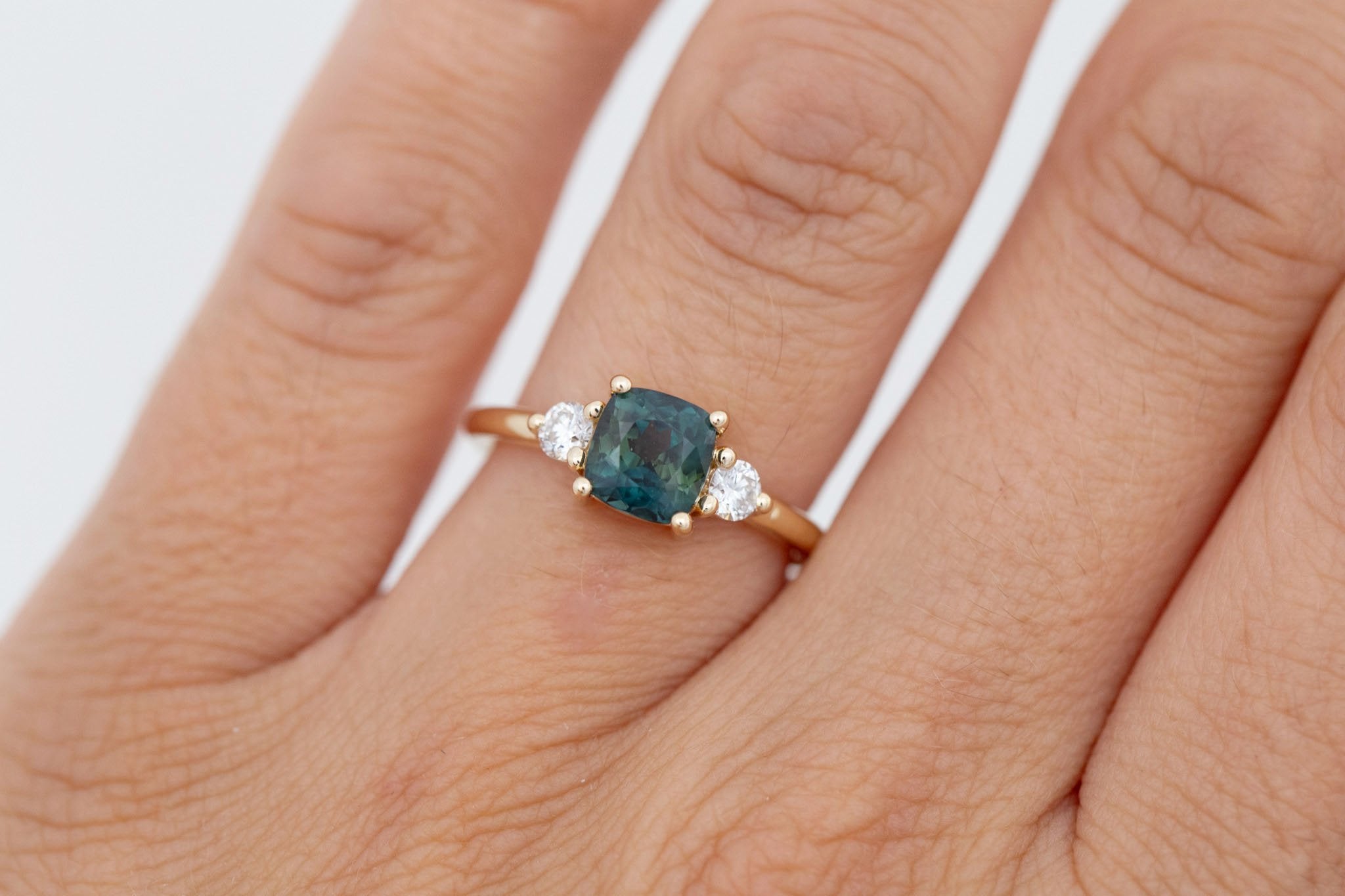Maeve Ring | Bicolor Teal Cushion Sapphire + Round Diamond Accent Engagement Ring 1.72 ct | 14k Recycled Gold | One of a Kind