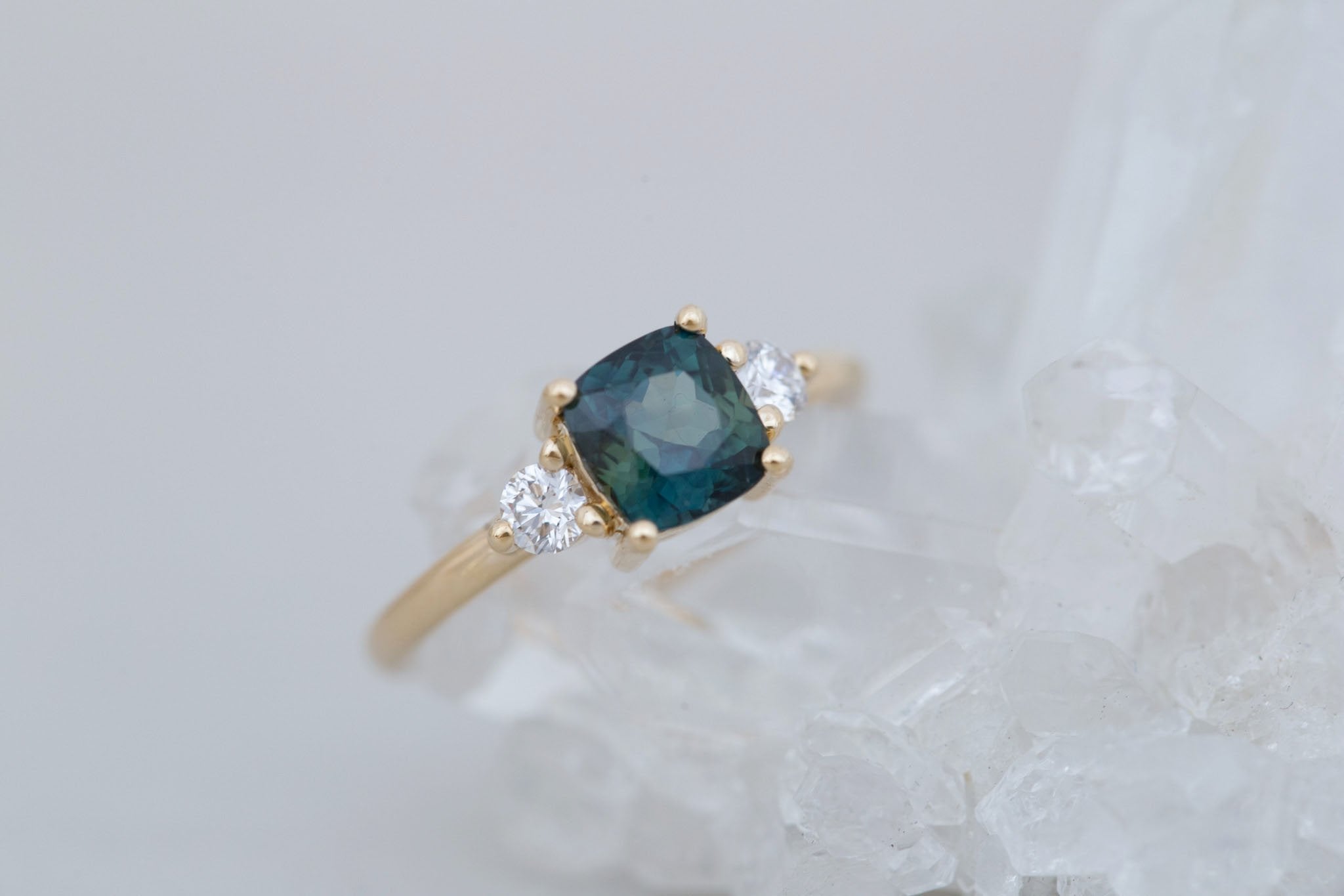 Maeve Ring | Bicolor Teal Cushion Sapphire + Round Diamond Accent Engagement Ring 1.72 ct | 14k Recycled Gold | One of a Kind