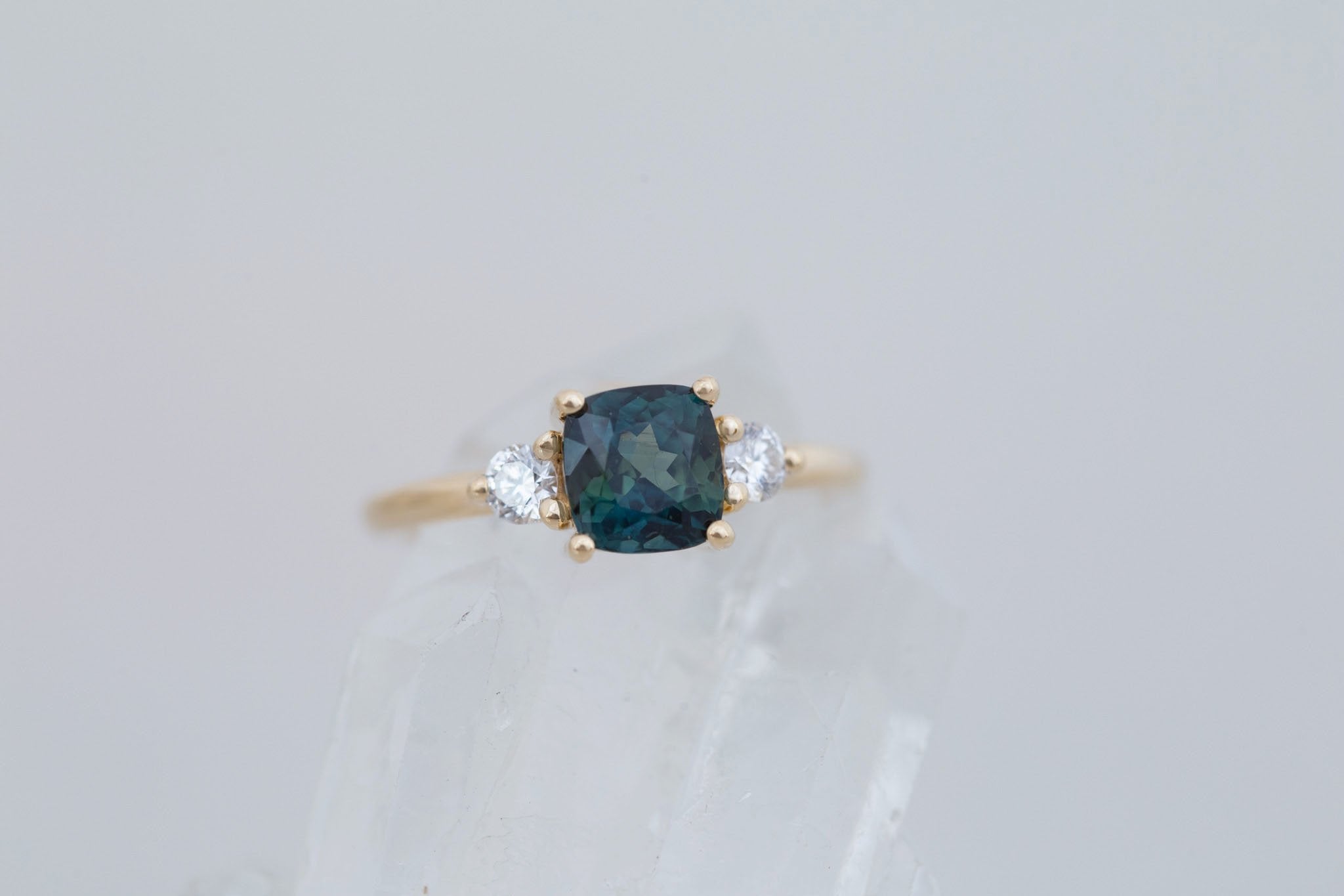 Maeve Ring | Bicolor Teal Cushion Sapphire + Round Diamond Accent Engagement Ring 1.72 ct | 14k Recycled Gold | One of a Kind