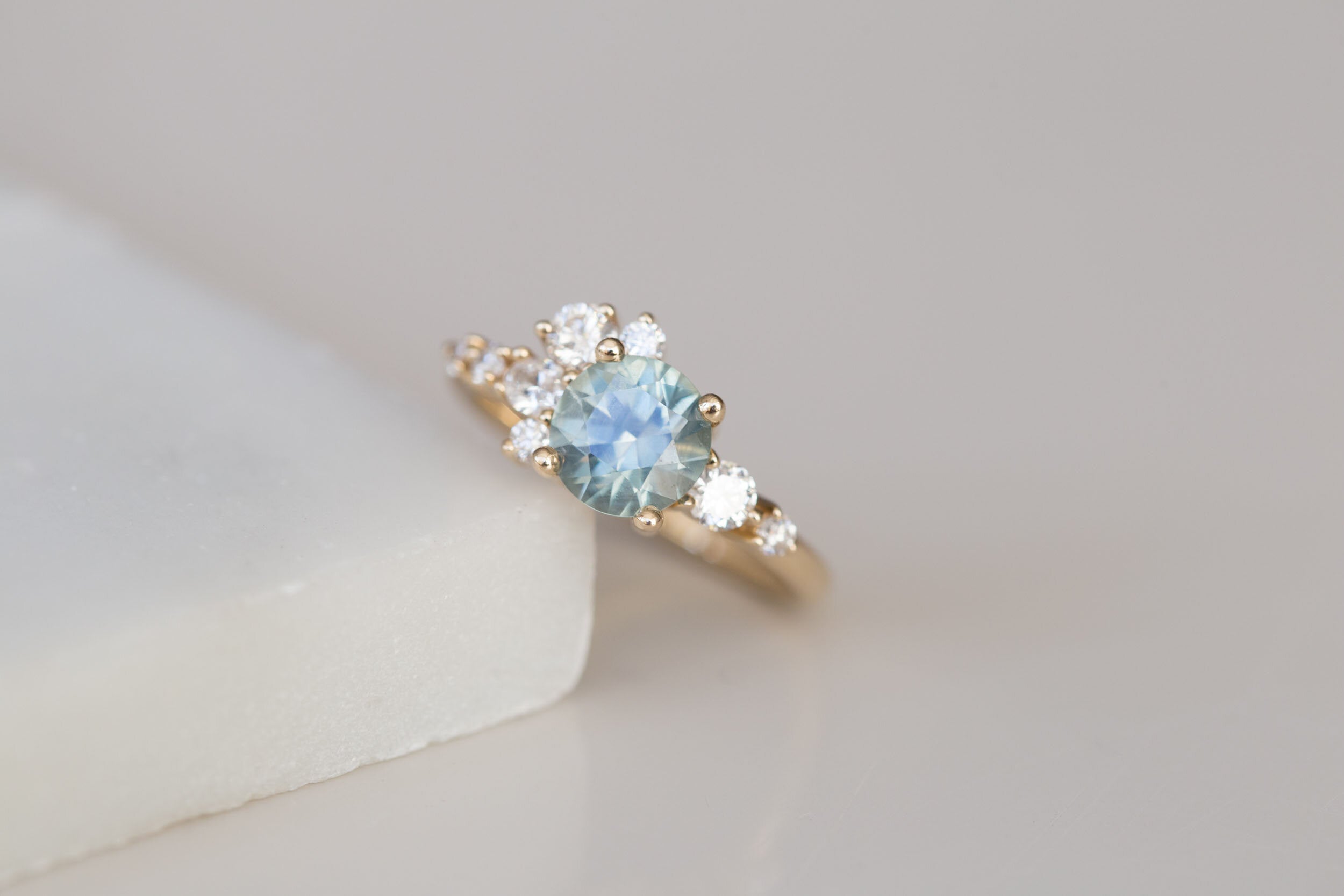 Ilia Ring | Montana Round Sapphire + Diamond Cluster Engagement Ring | 14k Recycled Gold