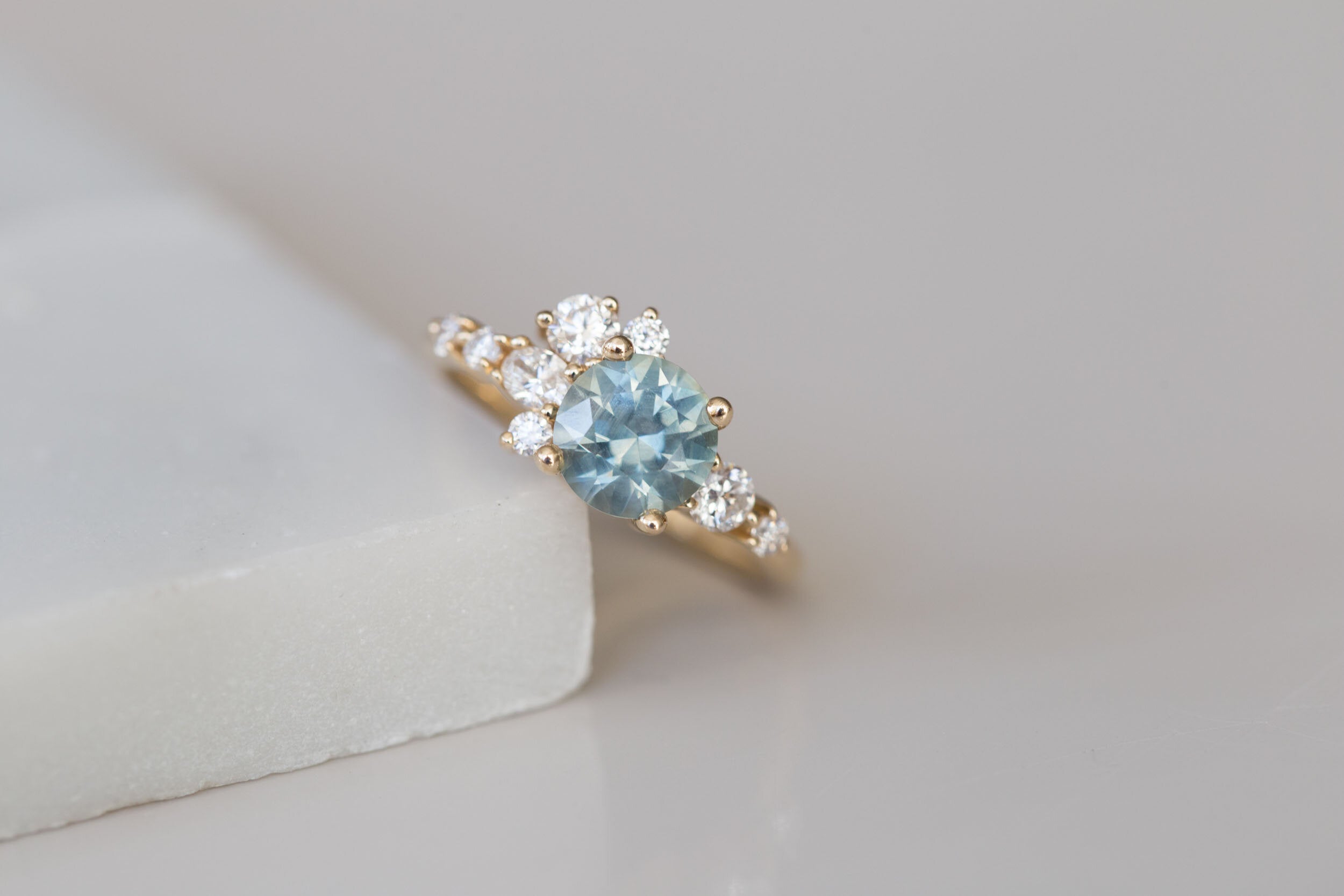 Ilia Ring | Montana Round Sapphire + Diamond Cluster Engagement Ring | 14k Recycled Gold