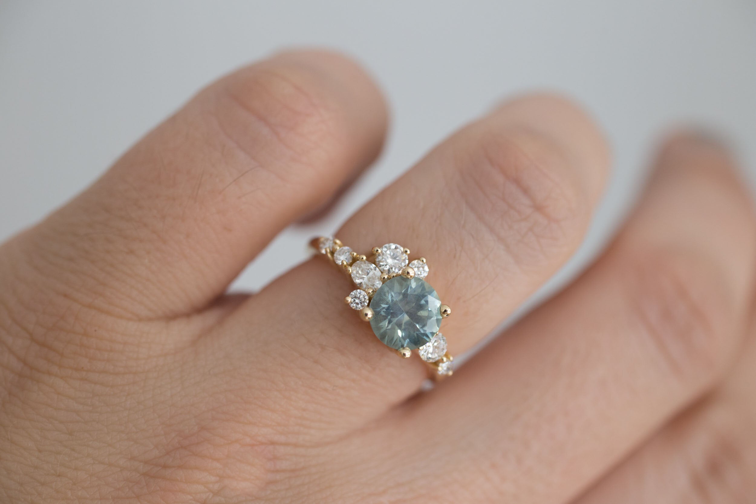 Ilia Ring | Montana Round Sapphire + Diamond Cluster Engagement Ring | 14k Recycled Gold