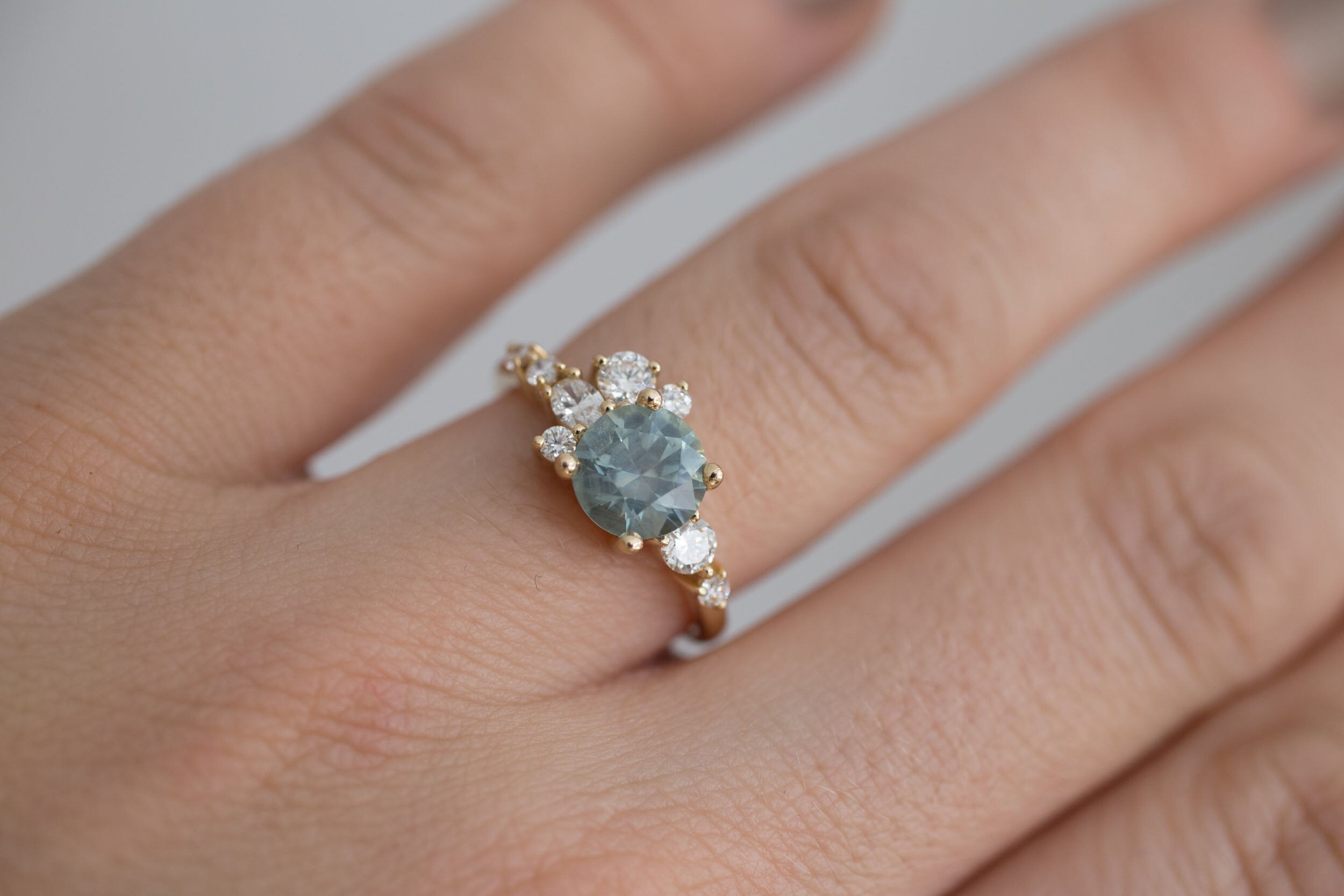 Ilia Ring | Montana Round Sapphire + Diamond Cluster Engagement Ring | 14k Recycled Gold