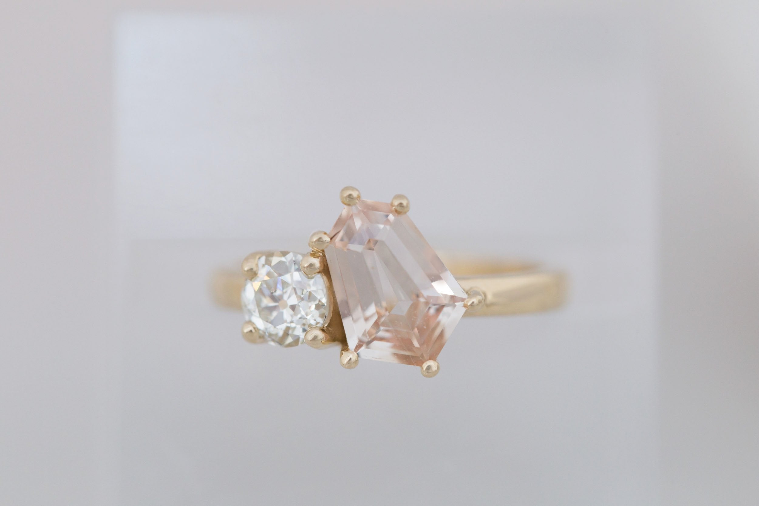 Liana Ring | Peach Geometric Step Cut Sapphire + Round Diamond Engagement Ring 1.80 ct | 14k Recycled Gold | One of a Kind