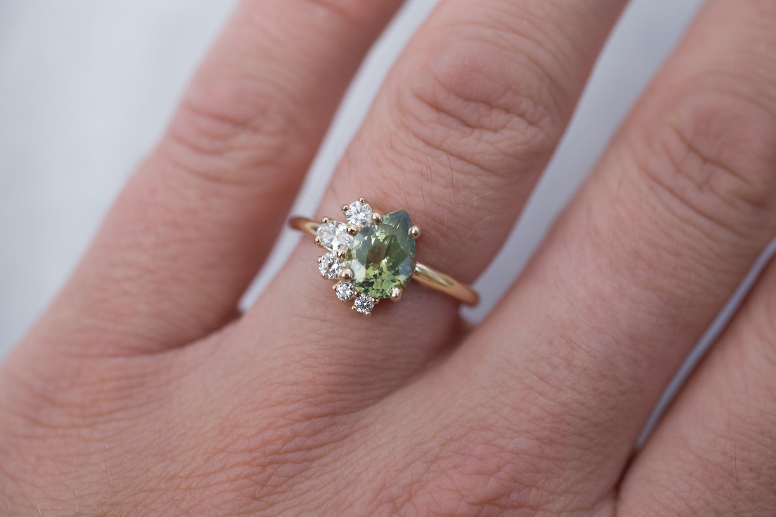 Evaline Ring | Pear Cut Bicolor Green Sapphire + Asymmetrical Diamond Cluster Engagement Ring 1.88 ct | 14k Recycled Gold | One of a Kind
