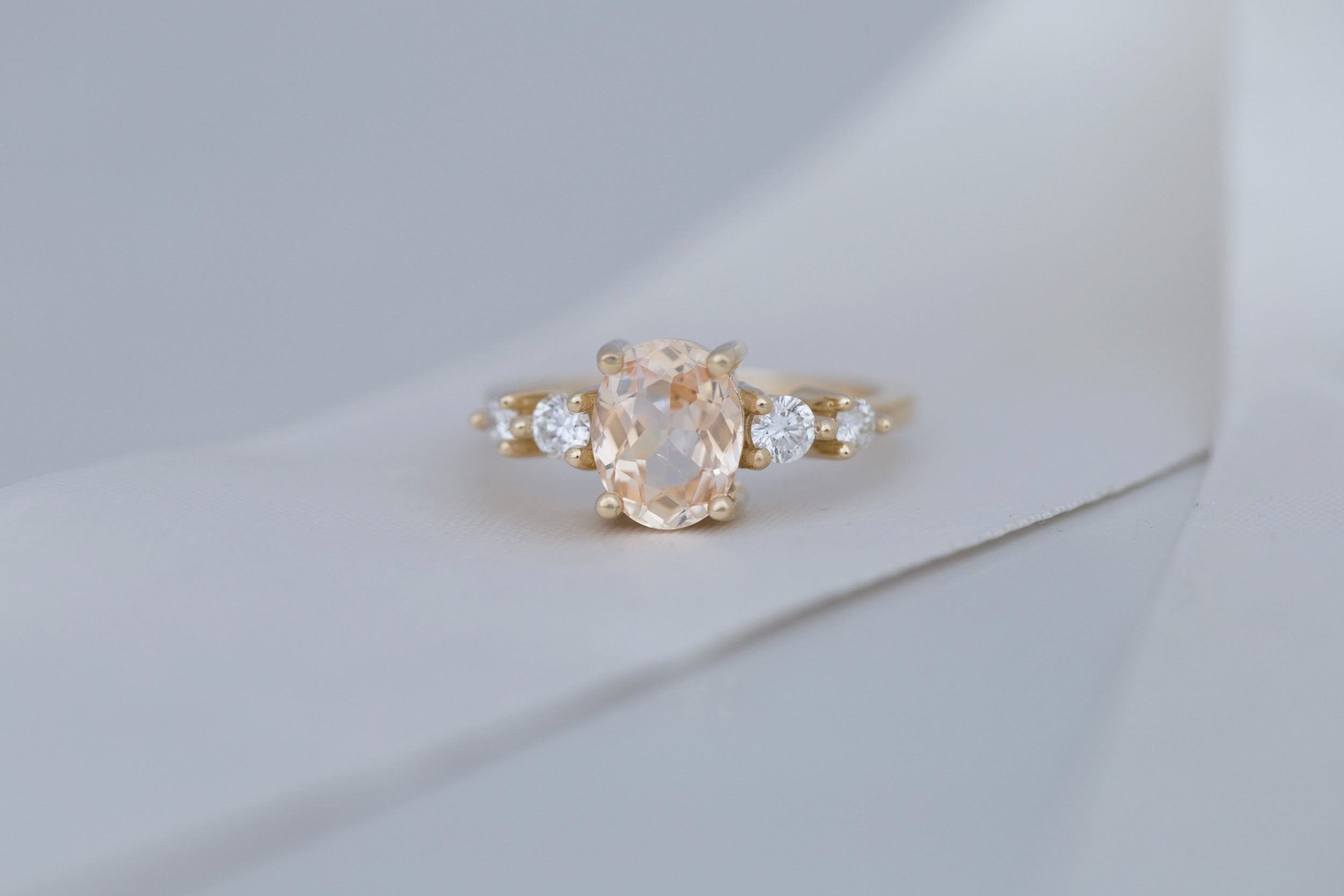 Arbor Ring | Peach Oval Sapphire + Round Diamond Accent Engagement Ring 1.90 ct | 14k Recycled Gold | One of a Kind