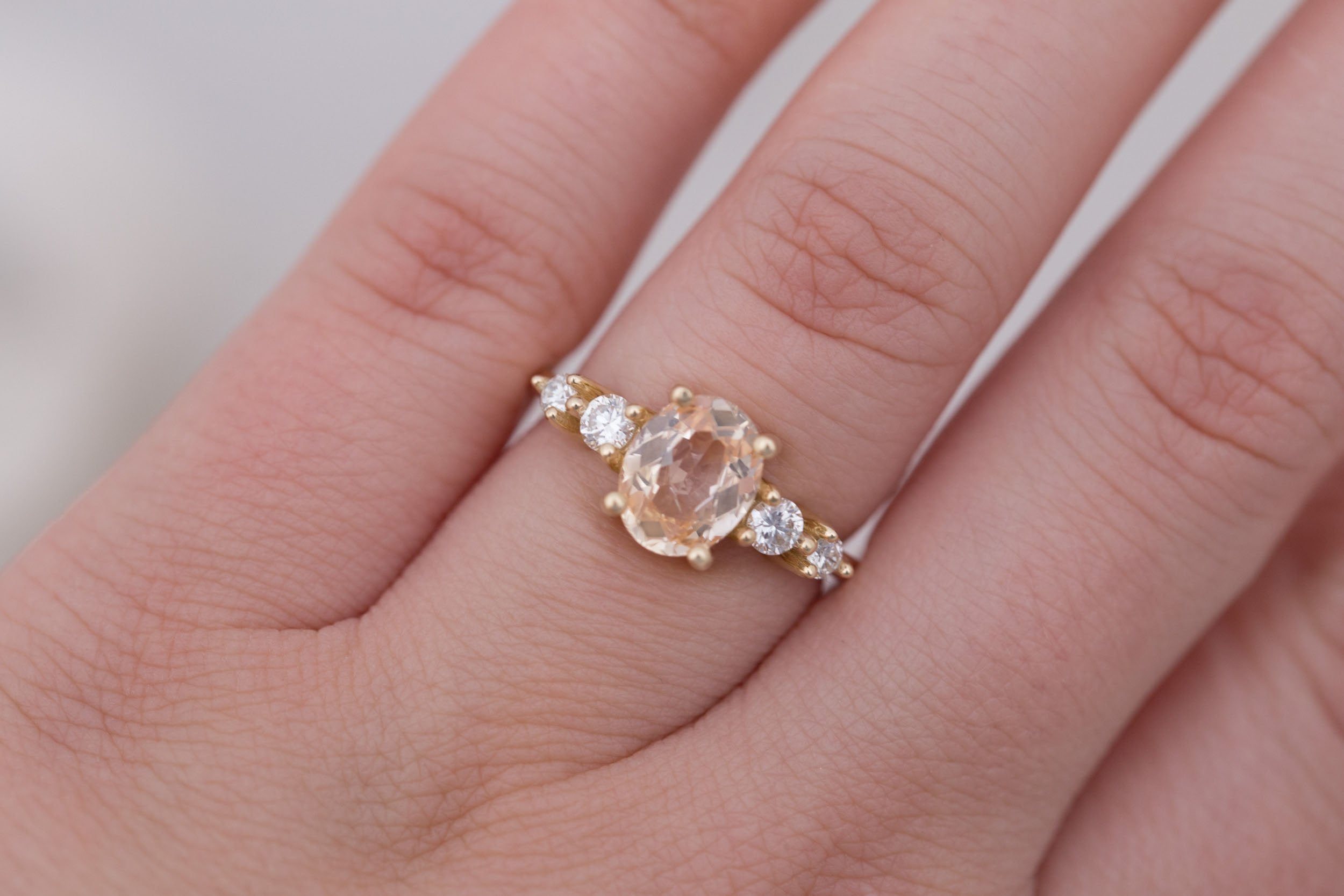Arbor Ring | Peach Oval Sapphire + Round Diamond Accent Engagement Ring 1.90 ct | 14k Recycled Gold | One of a Kind