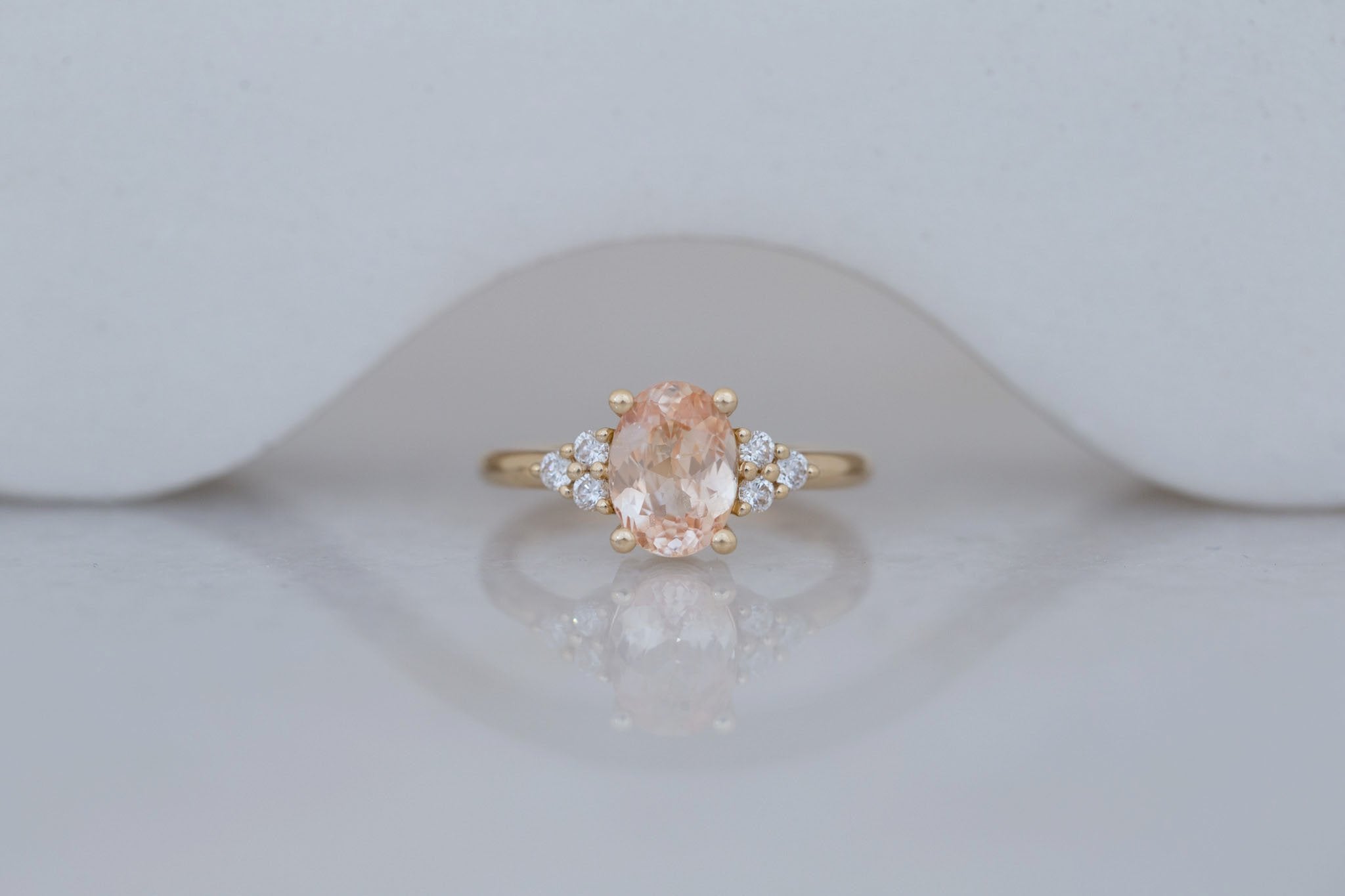 Verona Ring | Peach Oval Sapphire + Round Diamond Accents Engagement Ring 2.05 ct | 14k Recycled Gold | One of a Kind