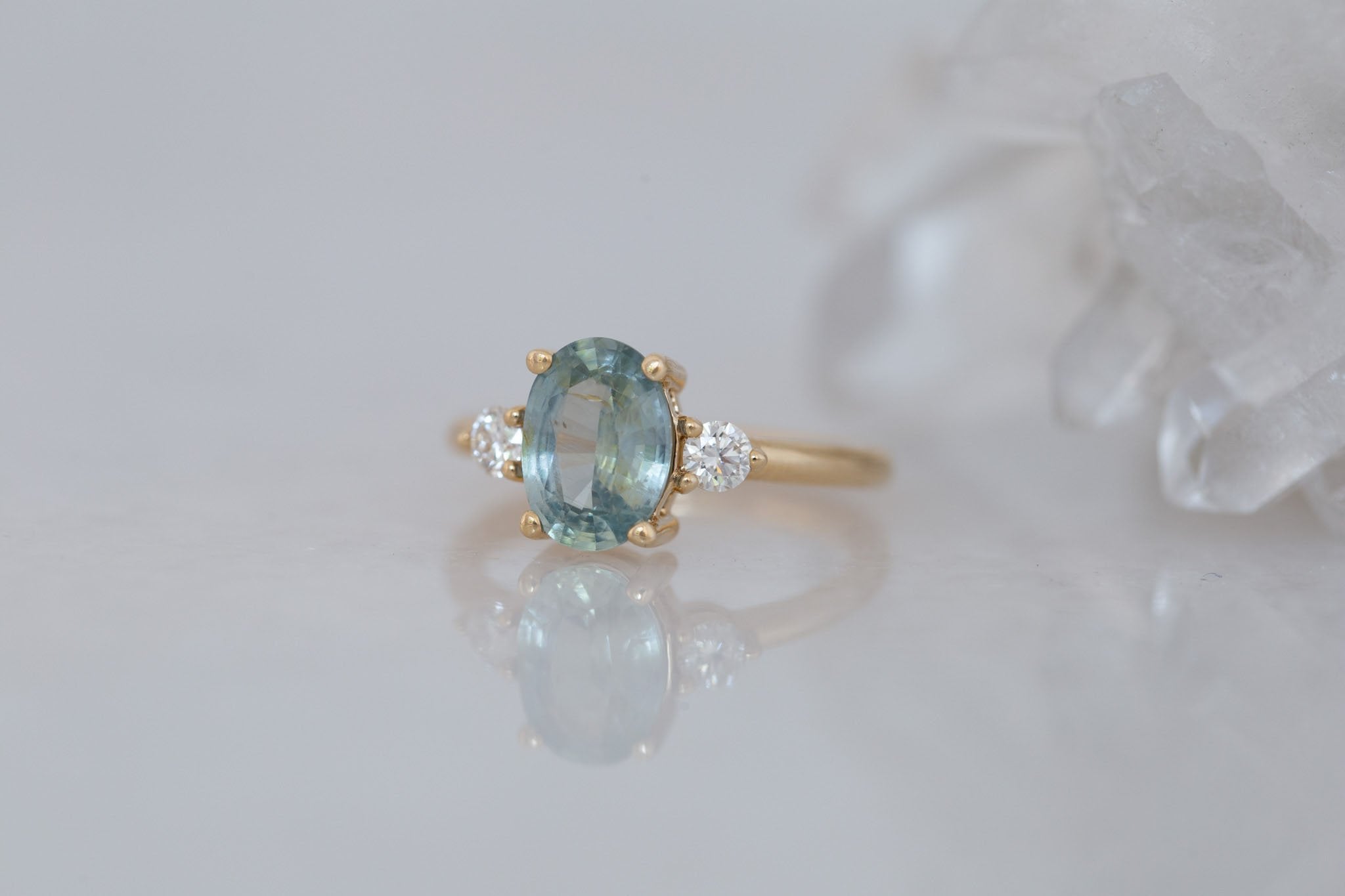 Maeve Ring | Mint Green Oval Sapphire + Round Diamond Accent Engagement Ring 2.21 ct | 14k Recycled Gold | One of a Kind