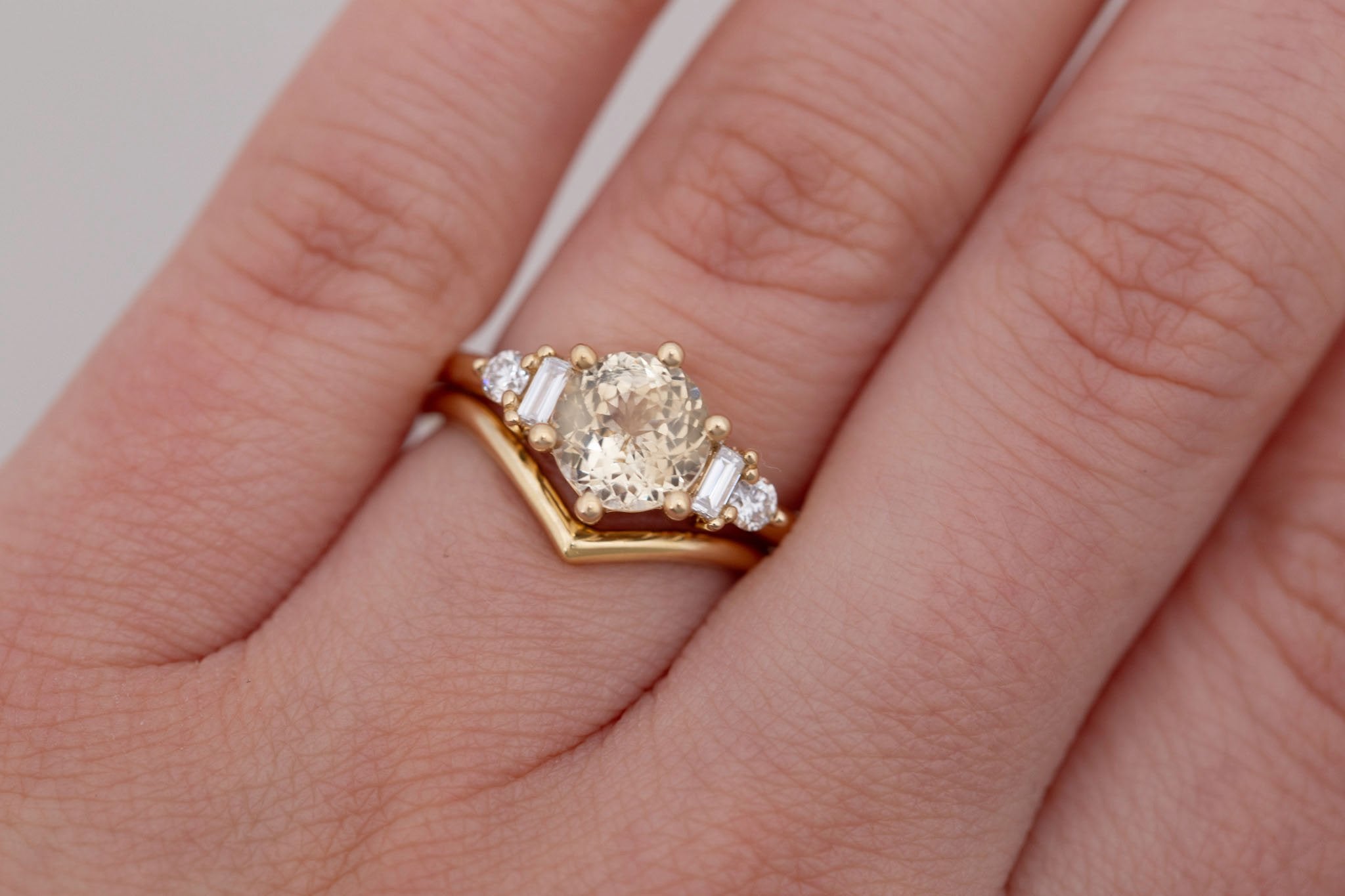 Alsea Ring | Apricot Sapphire + Baguette and Round Diamond Accent Engagement Ring 2.02 ct | 14k Recycled Gold | One of a Kind