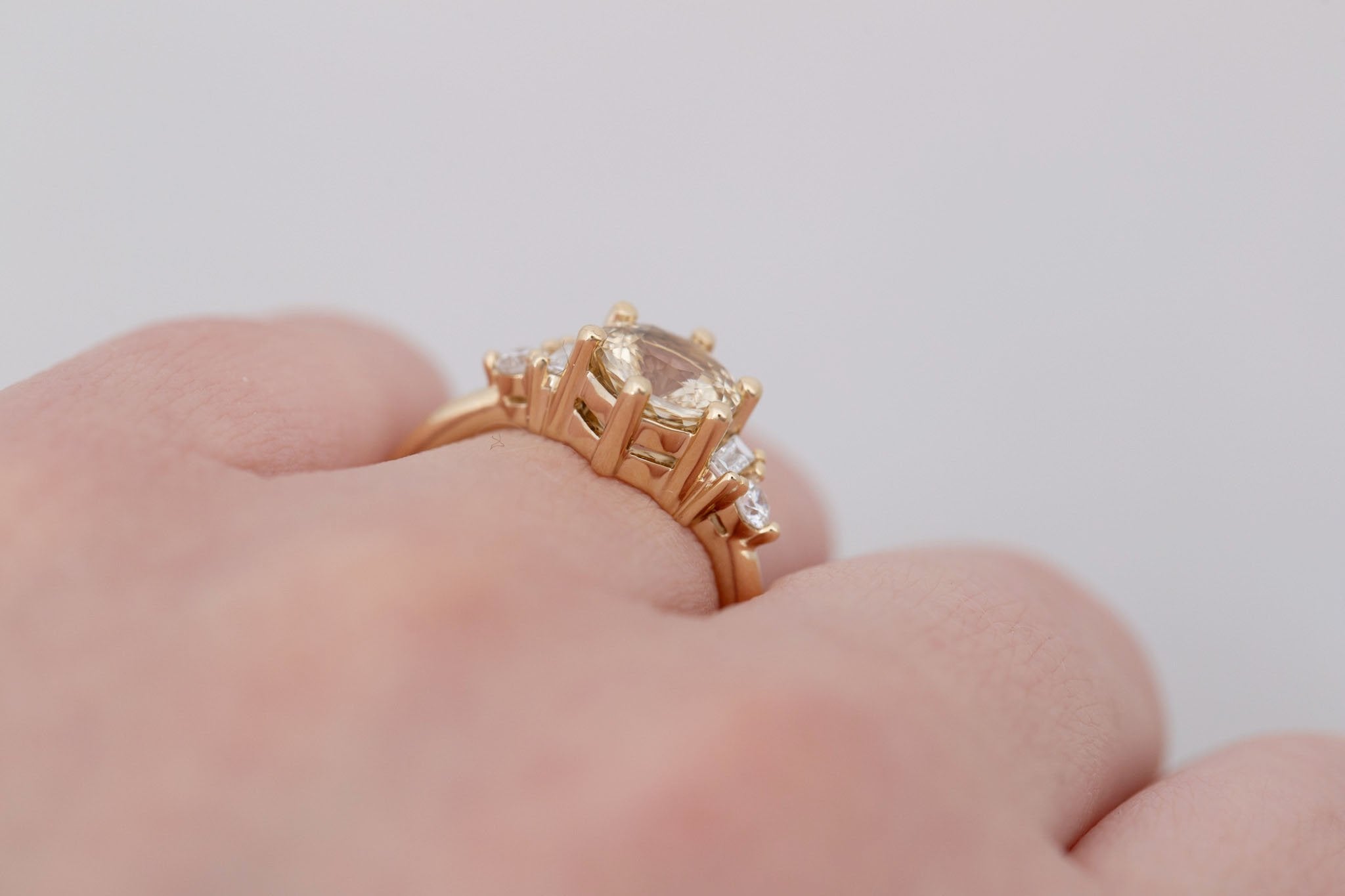 Alsea Ring | Apricot Sapphire + Baguette and Round Diamond Accent Engagement Ring 2.02 ct | 14k Recycled Gold | One of a Kind
