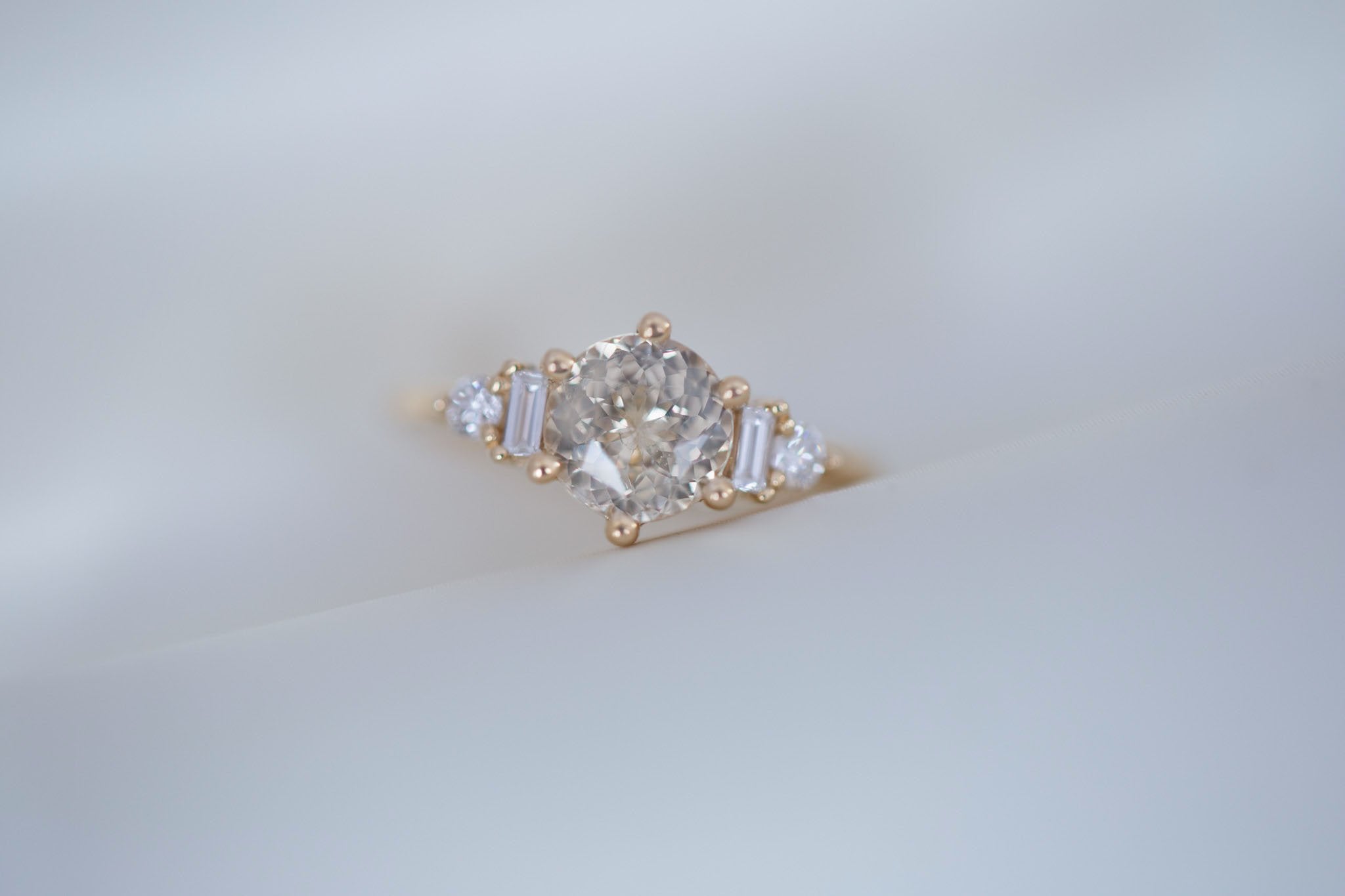 Alsea Ring | Apricot Sapphire + Baguette and Round Diamond Accent Engagement Ring 2.02 ct | 14k Recycled Gold | One of a Kind