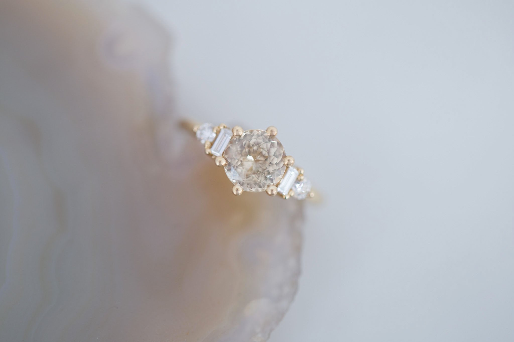 Alsea Ring | Apricot Sapphire + Baguette and Round Diamond Accent Engagement Ring 2.02 ct | 14k Recycled Gold | One of a Kind