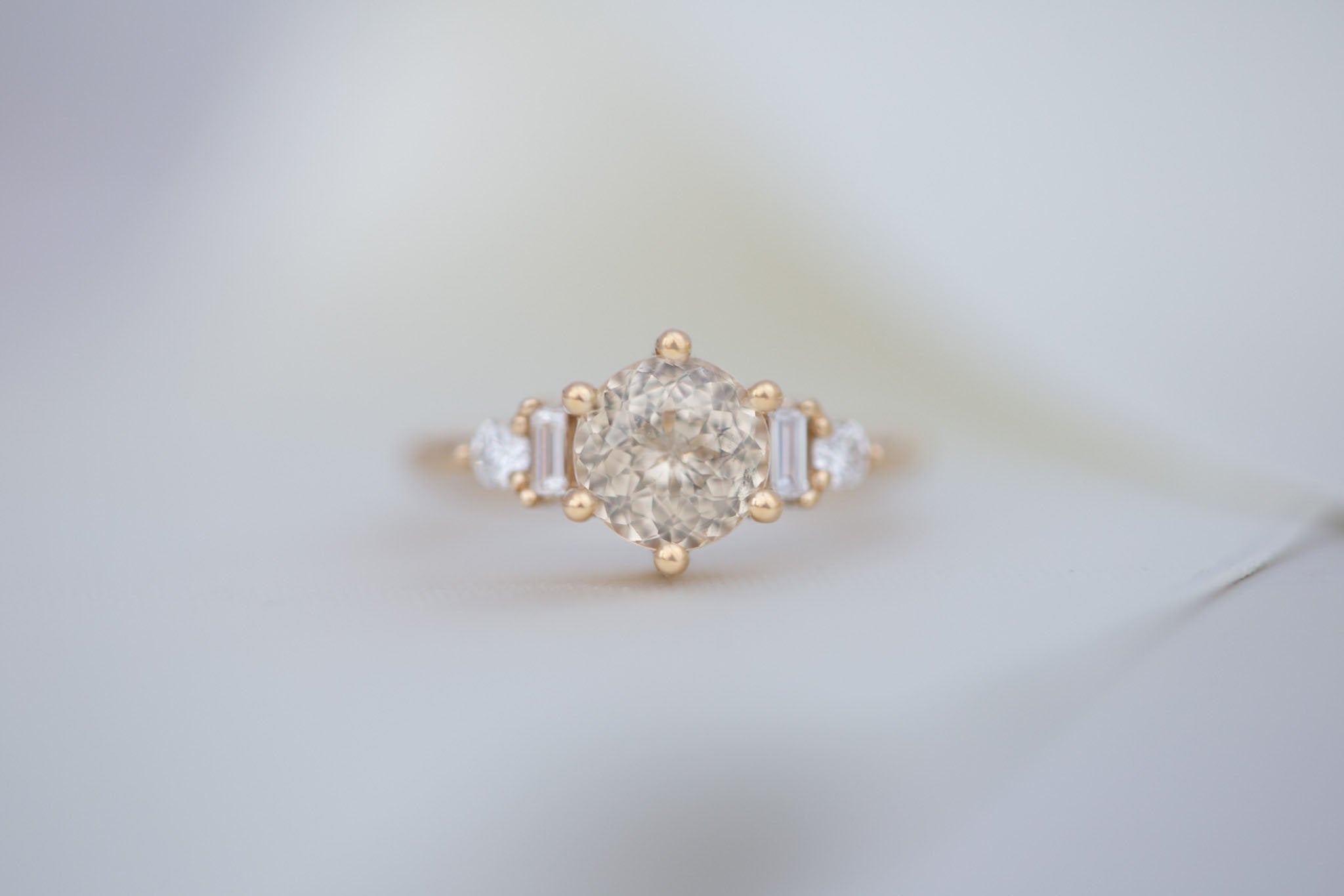 Alsea Ring | Apricot Sapphire + Baguette and Round Diamond Accent Engagement Ring 2.02 ct | 14k Recycled Gold | One of a Kind