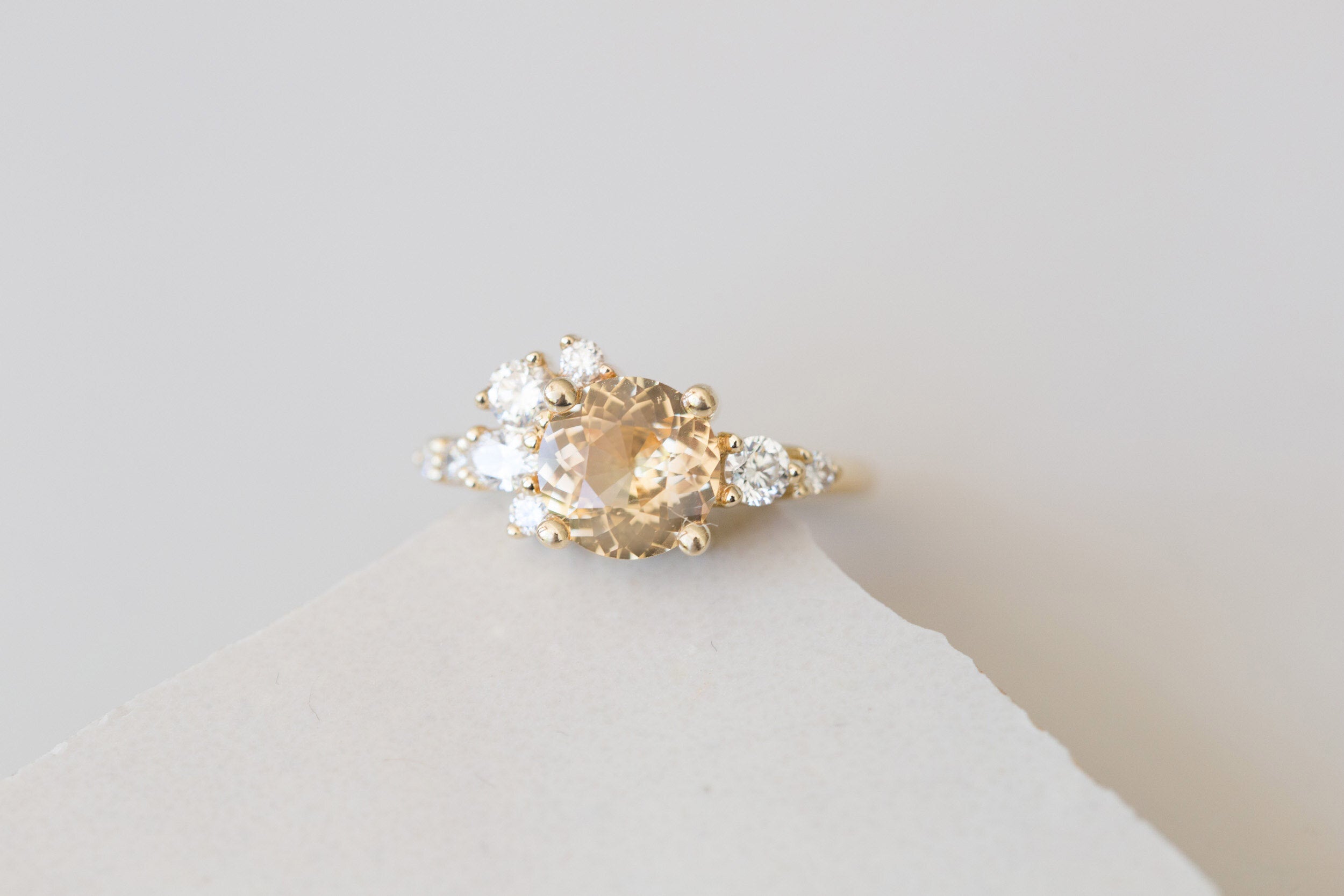 Ilia Ring | Round Apricot Sapphire + Diamond Cluster Engagement Ring 2.05 ct | 14k Recycled Gold | One of a Kind