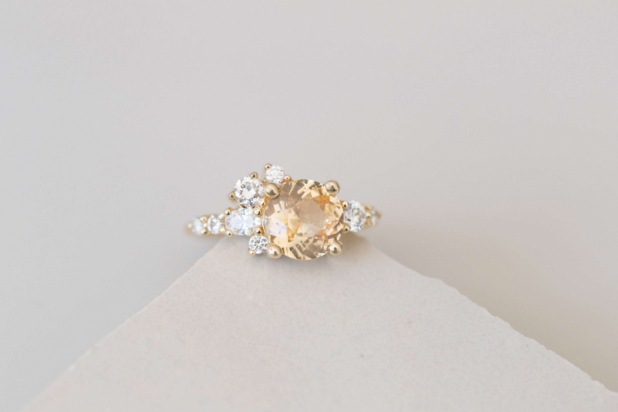 Ilia Ring | Round Apricot Sapphire + Diamond Cluster Engagement Ring 2.05 ct | 14k Recycled Gold | One of a Kind