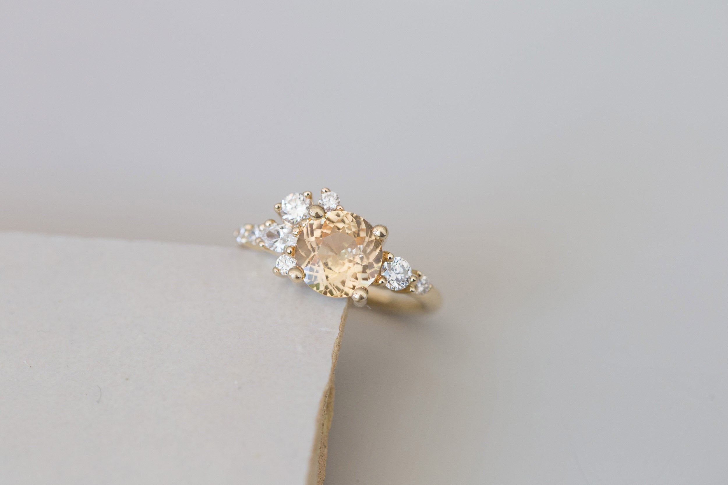 Ilia Ring | Round Apricot Sapphire + Diamond Cluster Engagement Ring 2.05 ct | 14k Recycled Gold | One of a Kind