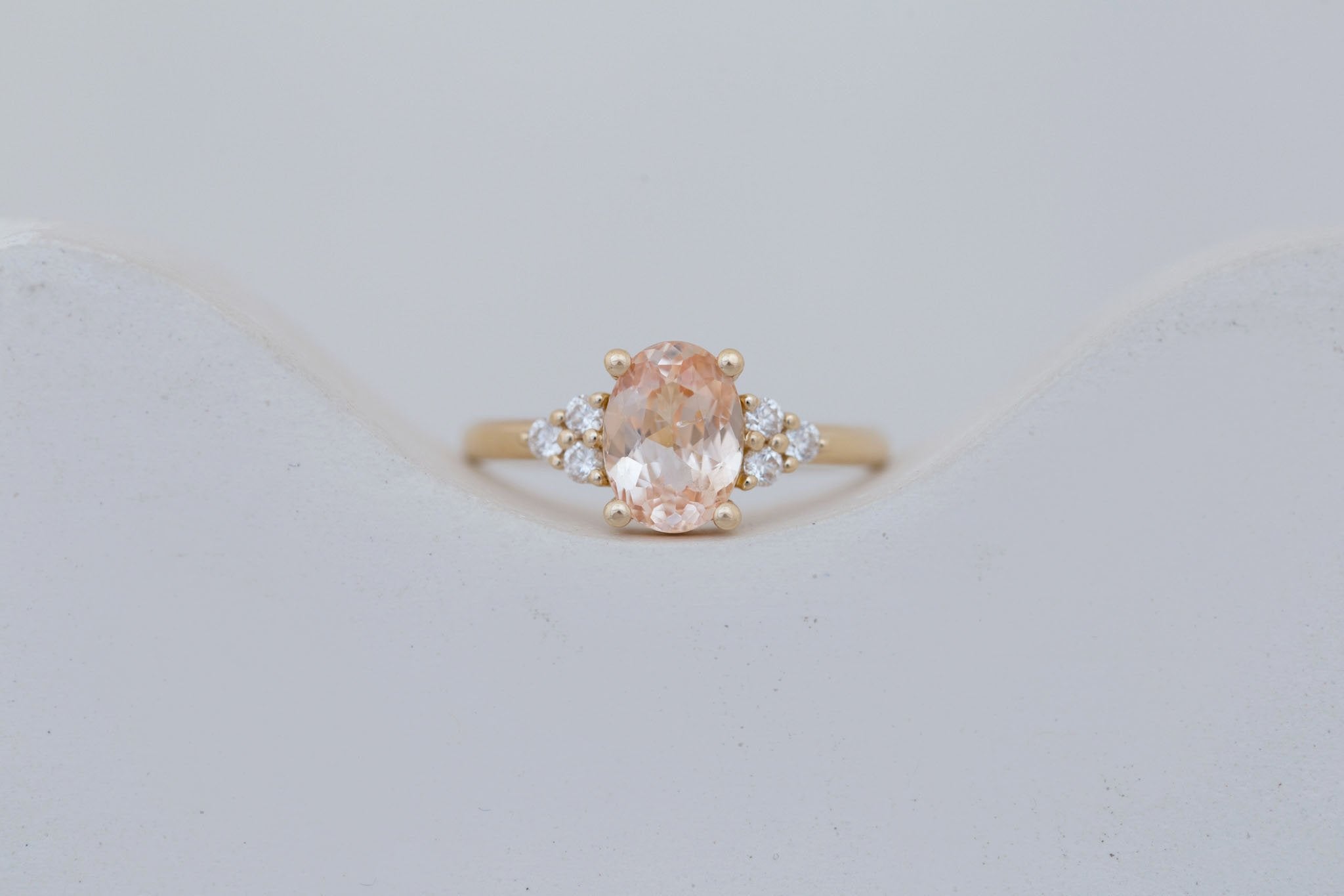 Verona Ring | Peach Oval Sapphire + Round Diamond Accents Engagement Ring 2.05 ct | 14k Recycled Gold | One of a Kind