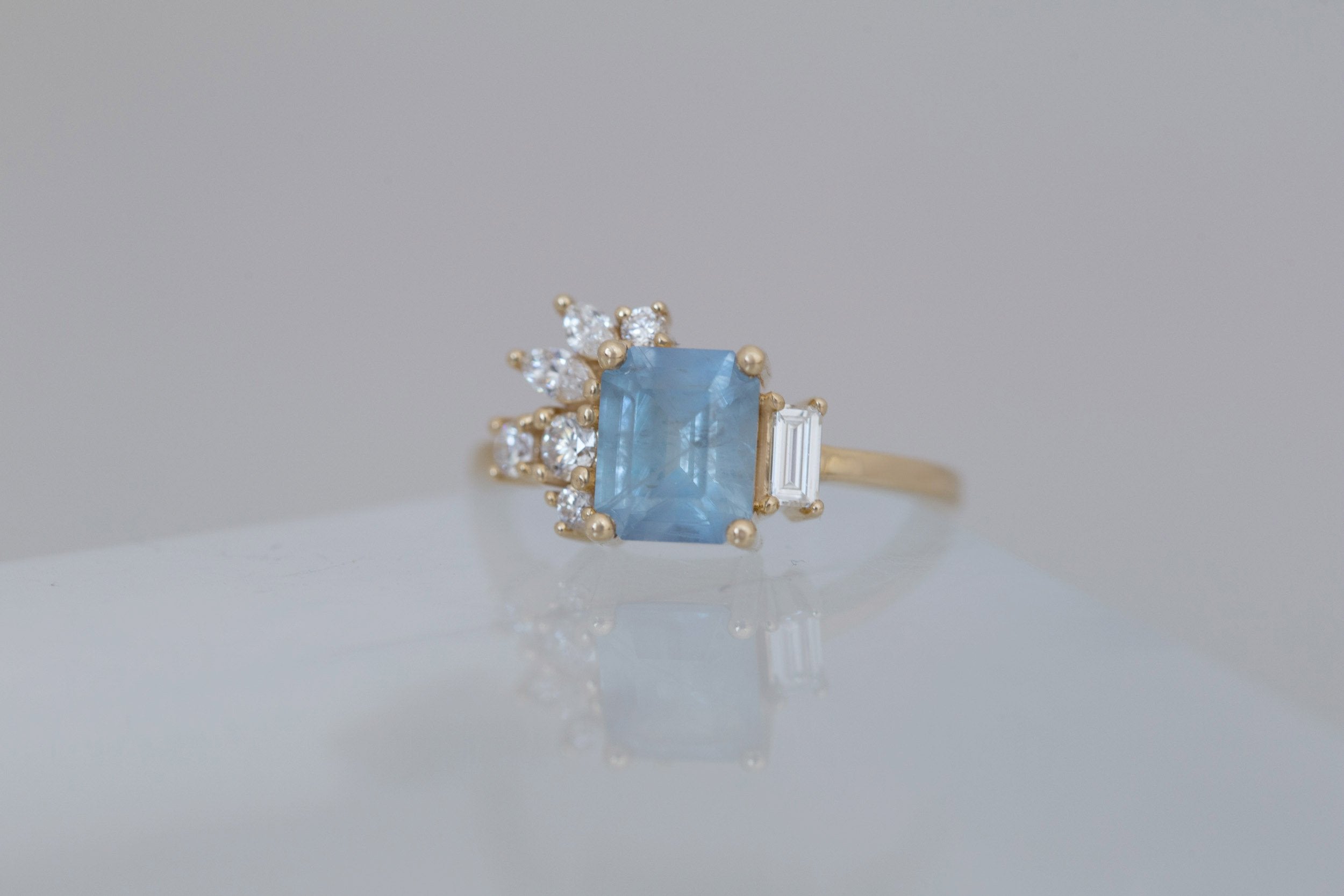 Iona Ring | Icy Blue Emerald Cut Sapphire + Diamond Cluster Engagement Ring 2.06 ct | 14k Recycled Gold | One of a Kind