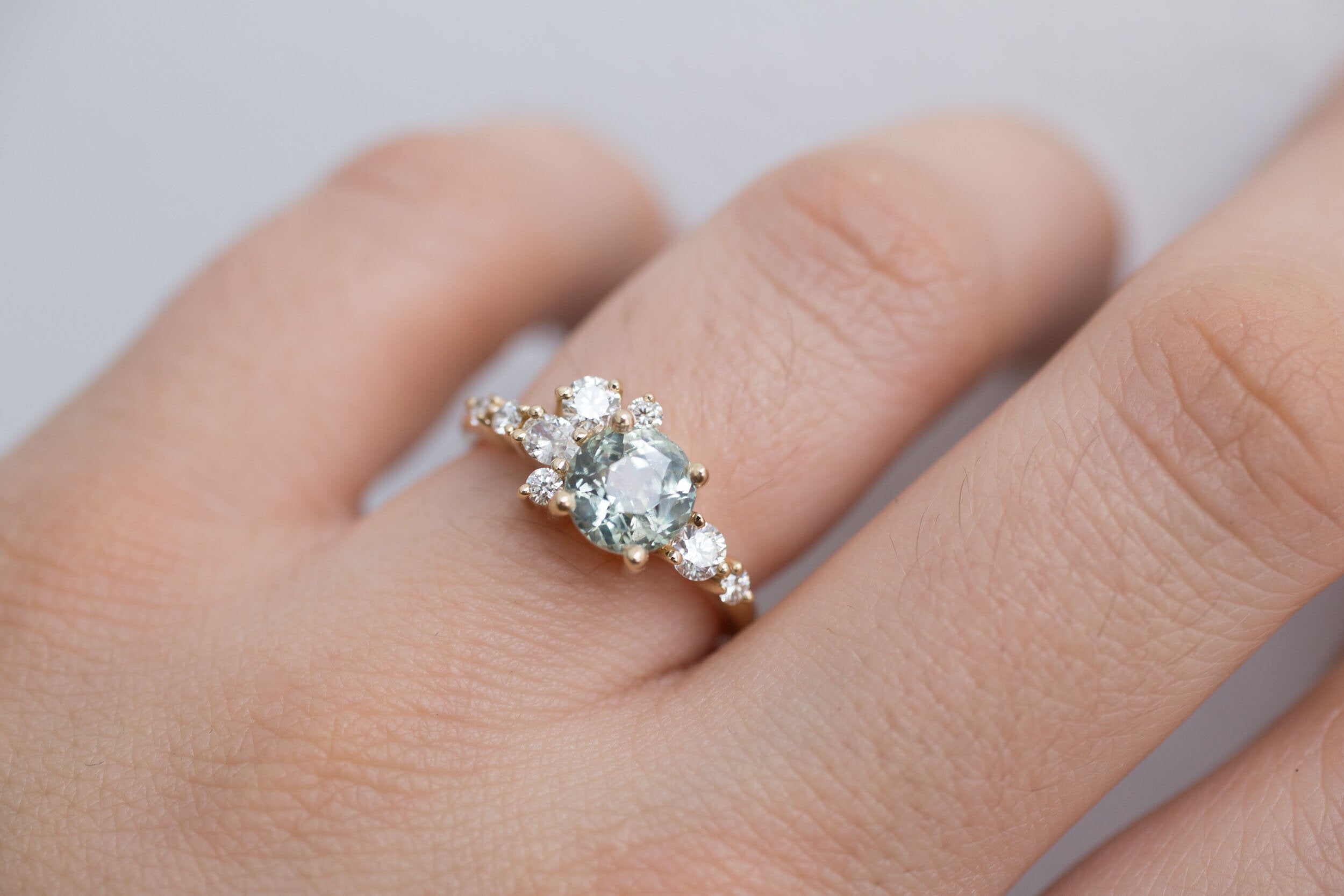 Ilia Ring | Mint Green Round Sapphire 2.07 ct + Diamond Cluster Engagement Ring | 14k Recycled Gold | One of a Kind