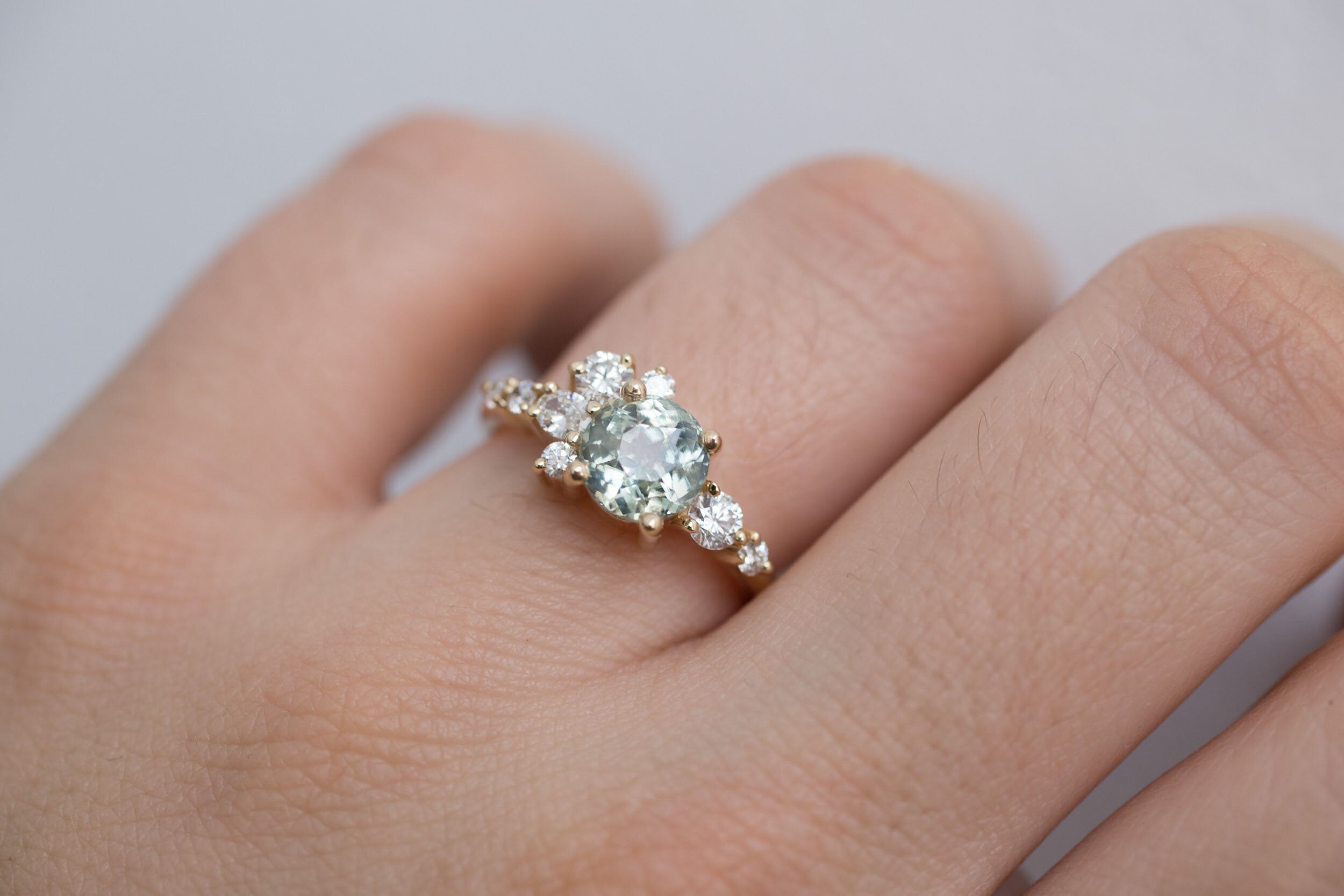 Ilia Ring | Mint Green Round Sapphire 2.07 ct + Diamond Cluster Engagement Ring | 14k Recycled Gold | One of a Kind