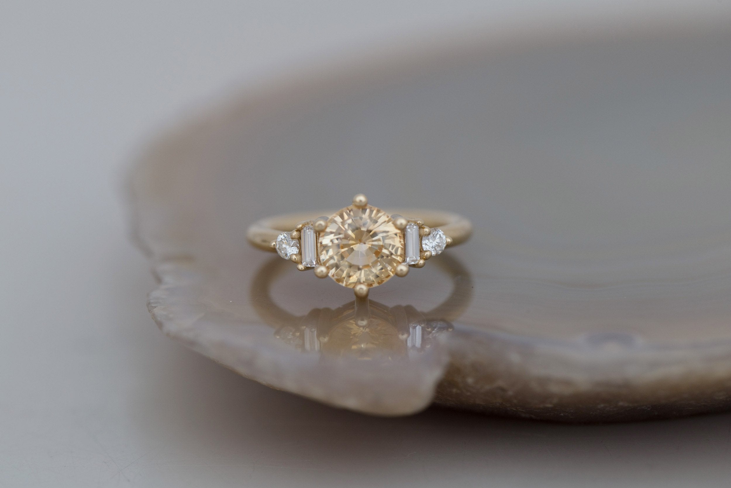 Alsea Ring | Apricot Sapphire + Baguette and Round Diamond Accent Engagement Ring 2.09 ct | 14k Recycled Gold | One of a Kind