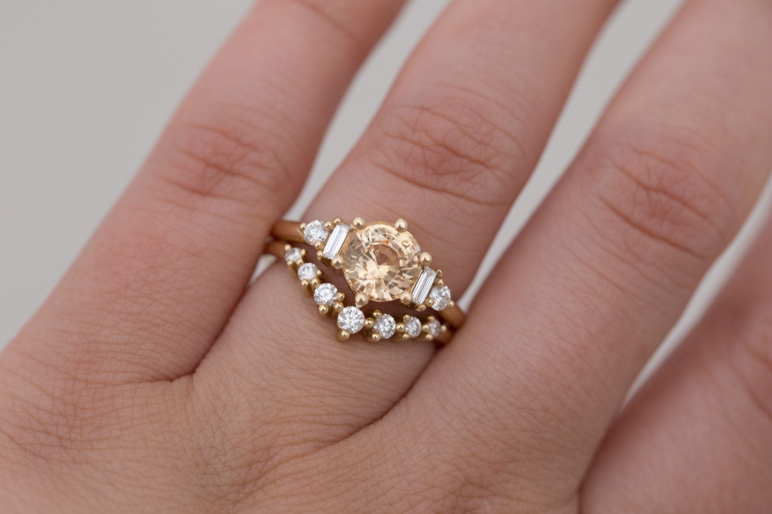 Alsea Ring | Apricot Sapphire + Baguette and Round Diamond Accent Engagement Ring 2.09 ct | 14k Recycled Gold | One of a Kind